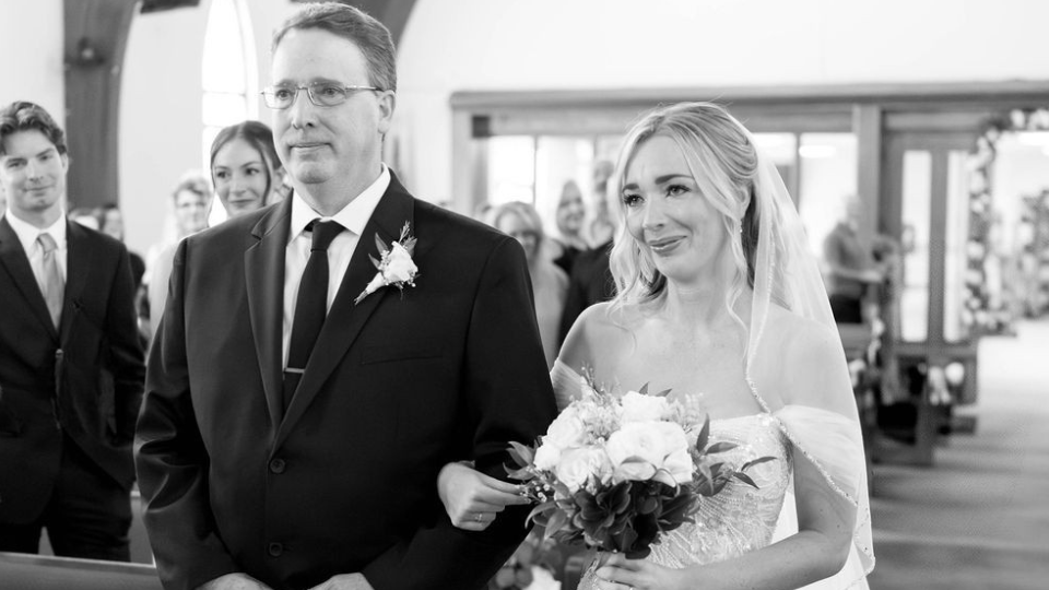 Bride walking down the aisle with her father