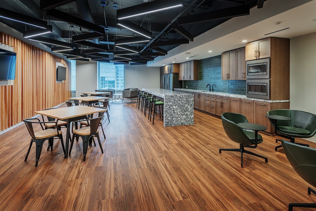 Contemporary commercial interior designed for professional use featuring open seating and built-in amenities by Esarey Construction