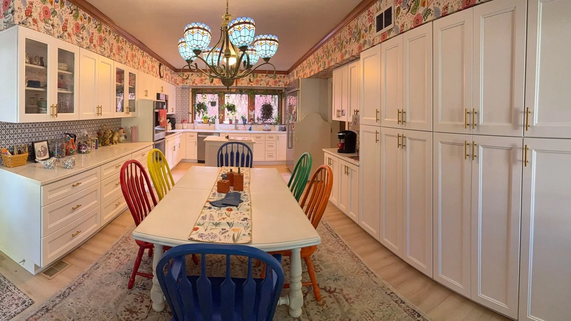 a stunning kitchen remodel and dining with new cabinets and countertops area showcasing coordinated layout, lighting details, and custom storage by Esarey Construction in Clarksville, Indiana 47129