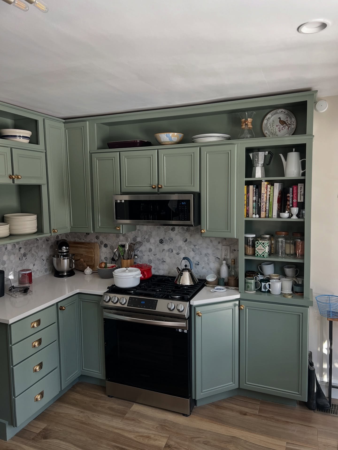 Cabinet renovation complete! Sage green and brass hardware, came out nice.