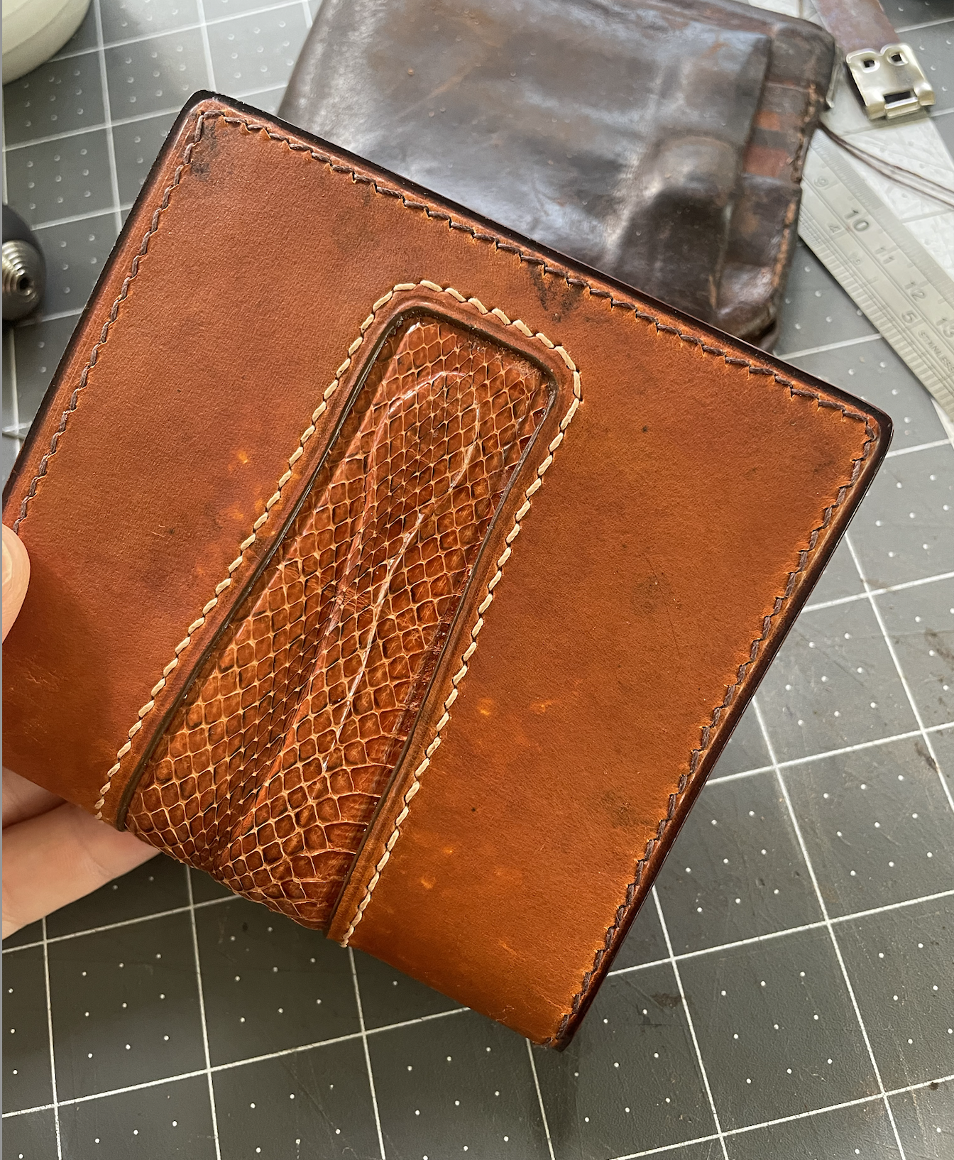bifold wallet with snake skin inlay