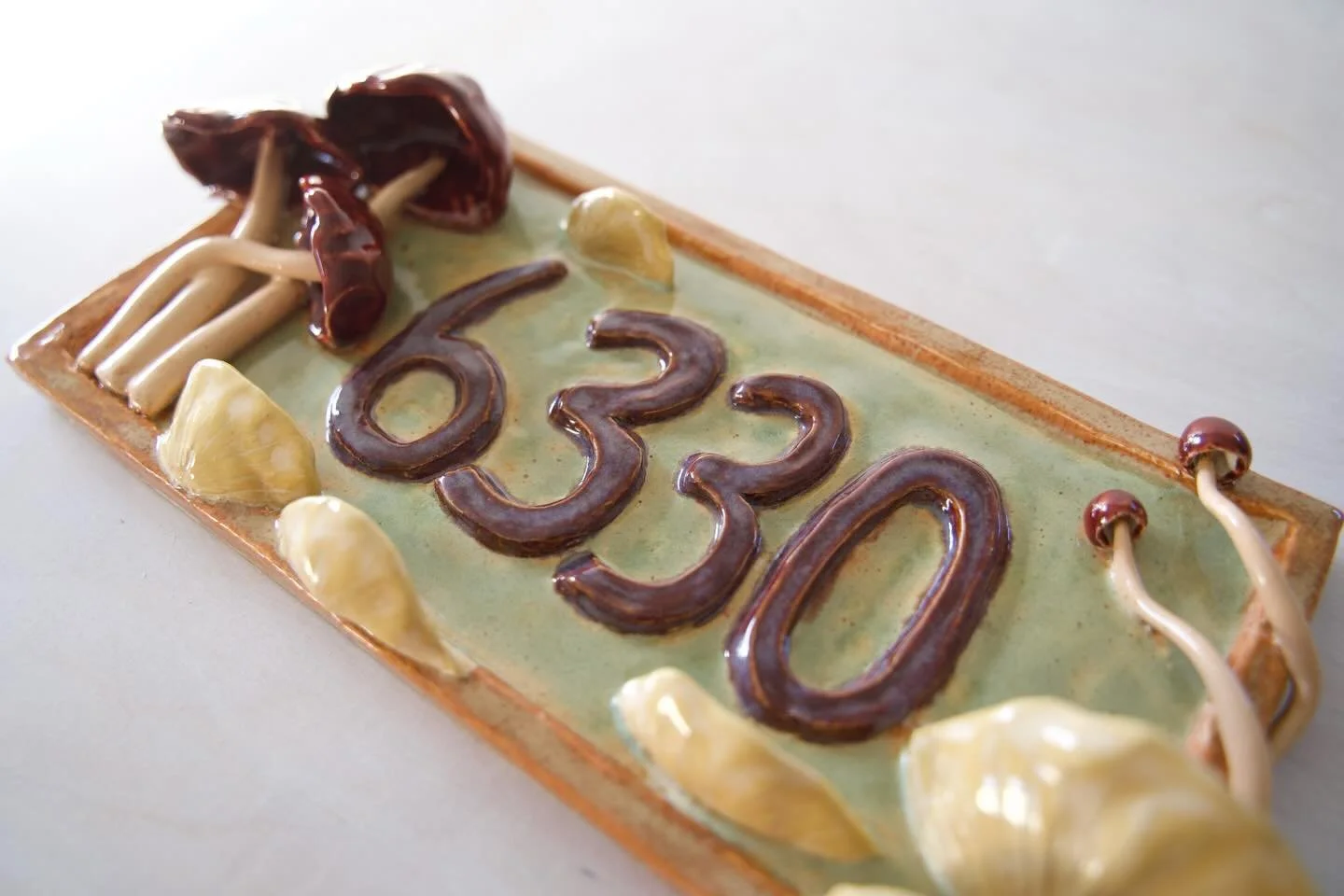 A fun-guy I created at the end of last year as a Christmas gift! Send me a message if you&rsquo;d like me to make something for you! 

#handmadeceramics #uniquegift #housenumber #curbappeal #mushroomart