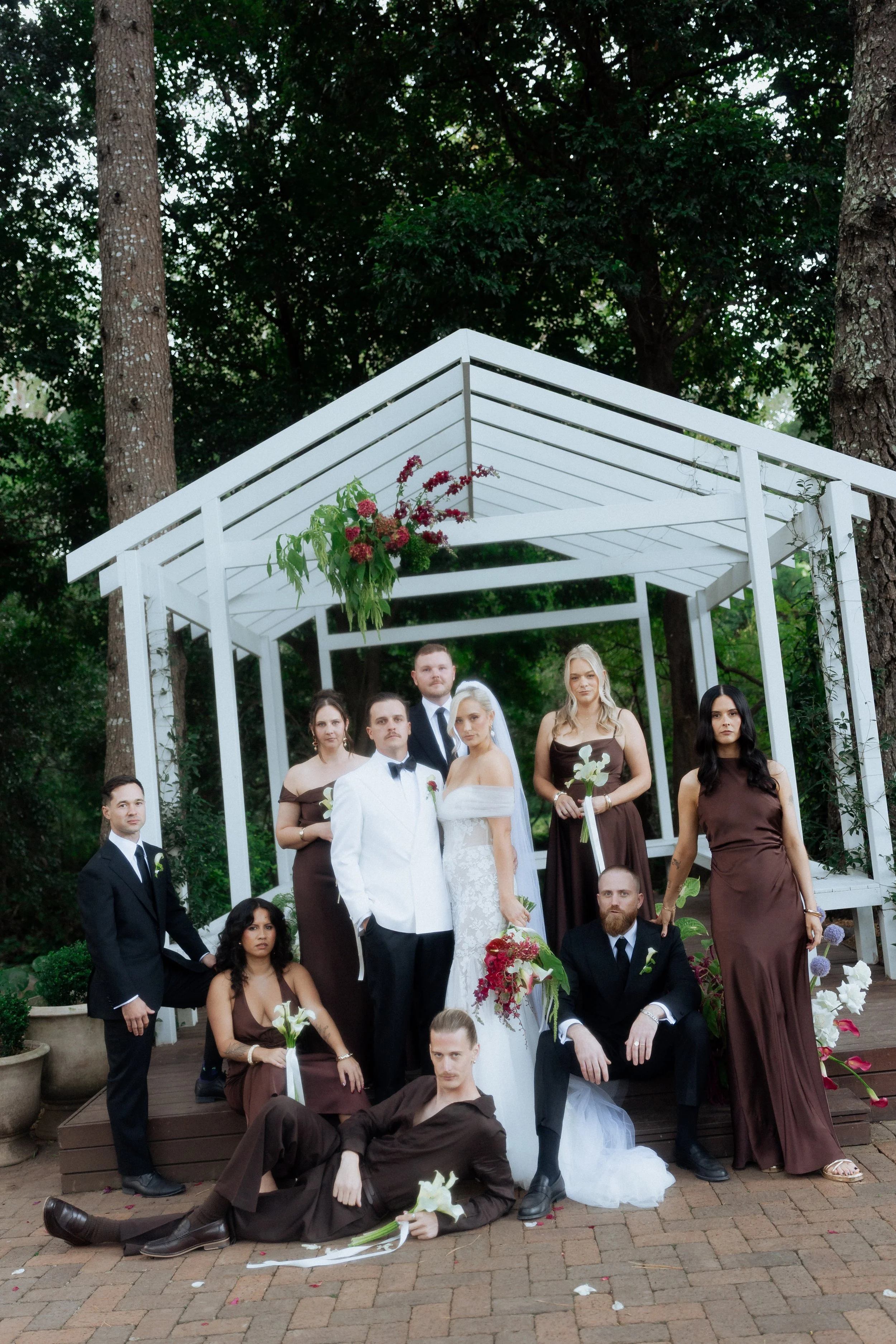 Colourful moody modern wedding ceremony florals at The Lodge Jamberoo