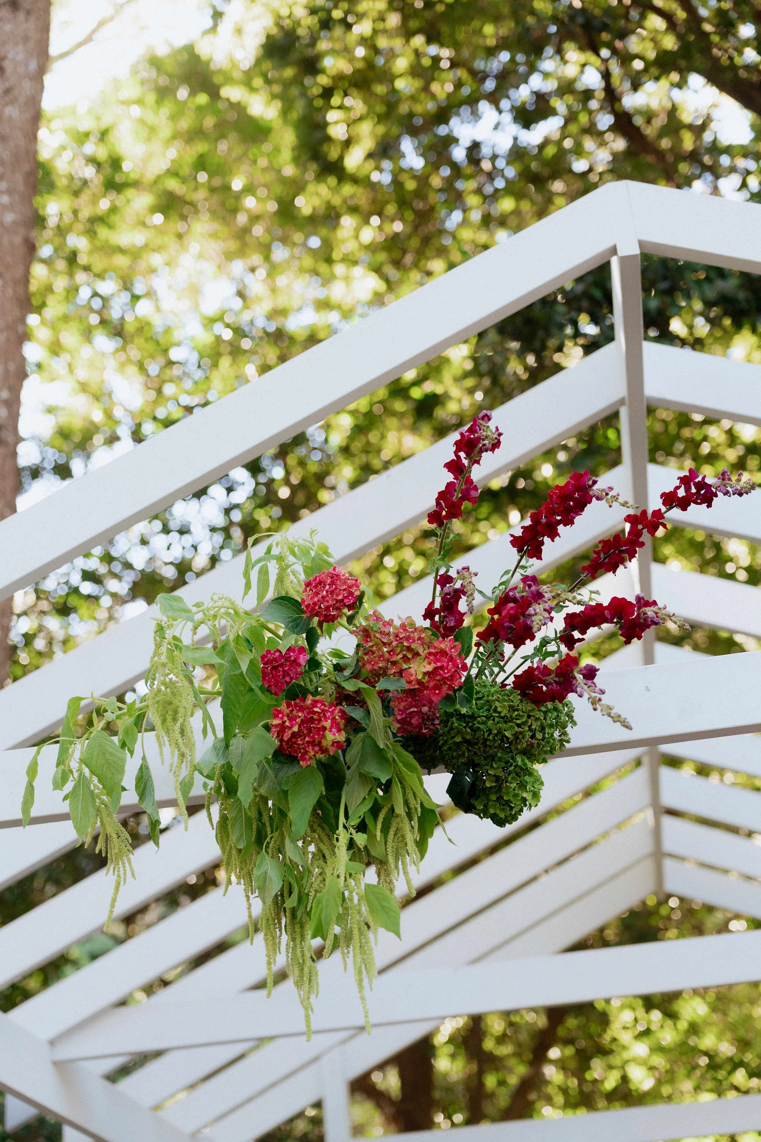 Colourful moody modern wedding ceremony florals at The Lodge Jamberoo