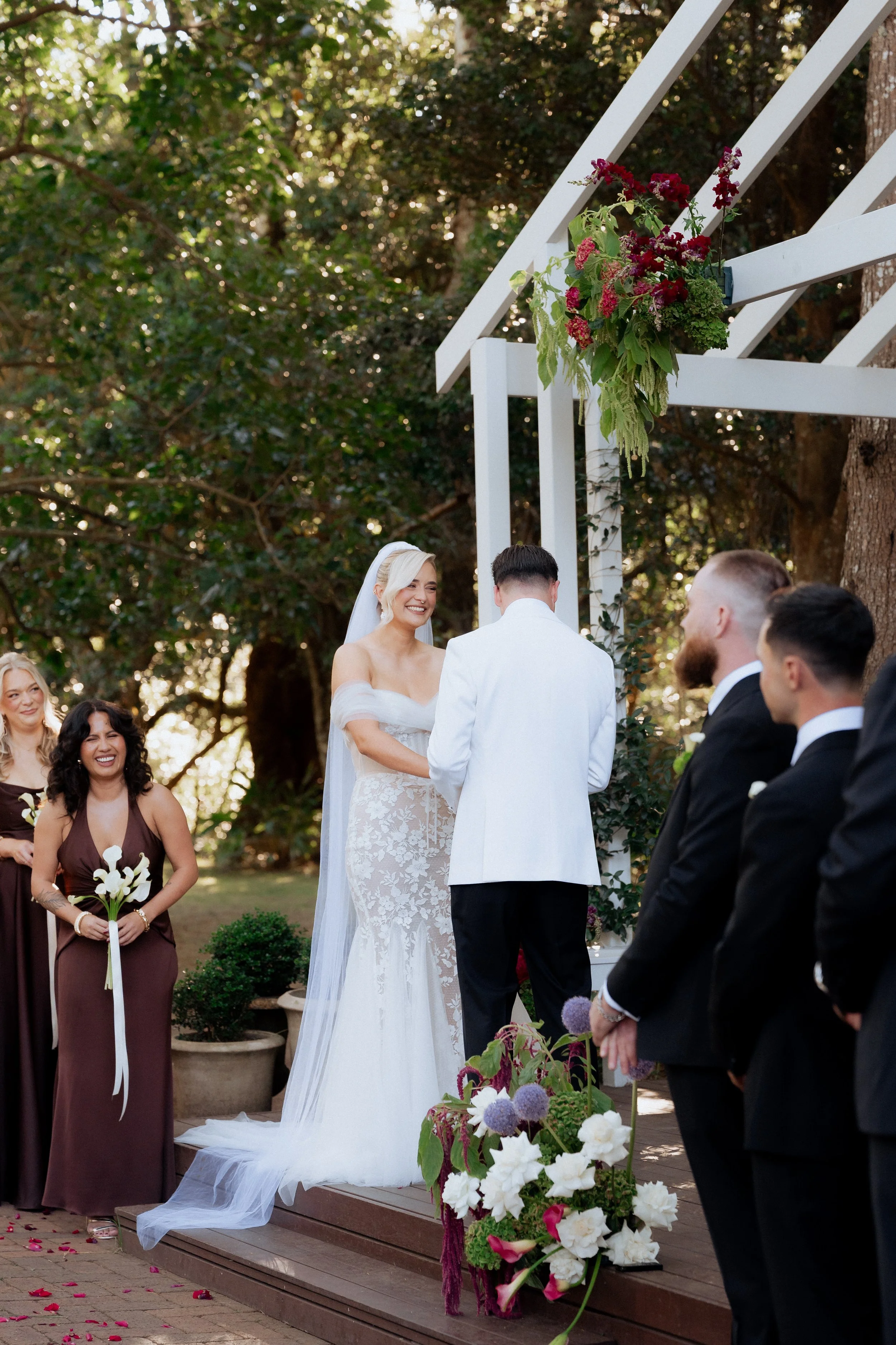 Colourful moody modern wedding ceremony florals at The Lodge Jamberoo