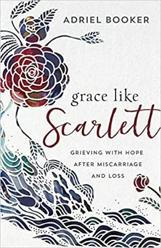 Book cover for "Grace Like Scarlett" by Adriel Booker, featuring floral and wave designs on a white background, with the subtitle "Grieving with Hope After Miscarriage and Loss."