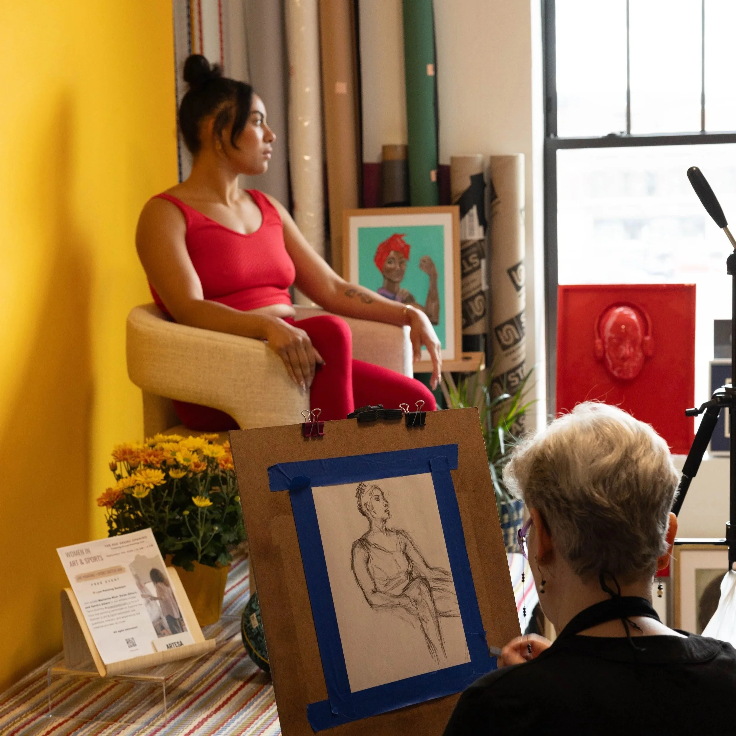 Close-up of a young woman with blonde hair and blue eyes looking directly at the camera.