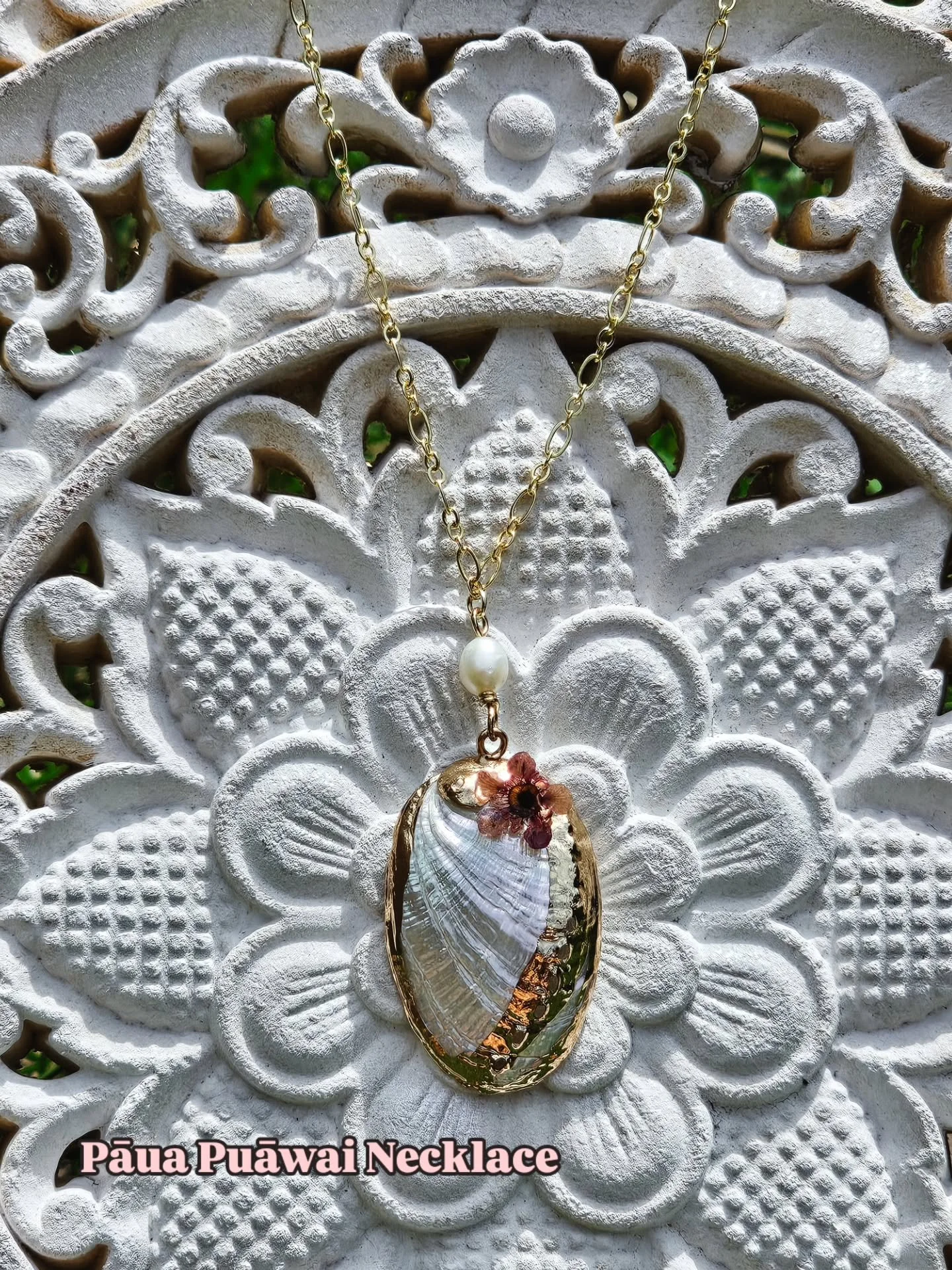 The Pāua Puāwai Necklace is a heartfelt homage to whakapapa, identity, and the journey of reconnection.

The flower sits at its heart, symbolising growth, renewal, and the courage to rediscover the parts of yourself that have always been there.

Crea