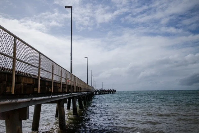 Palm Cove Jetty is a scenic landmark at the northern end of Palm Cove Beach.