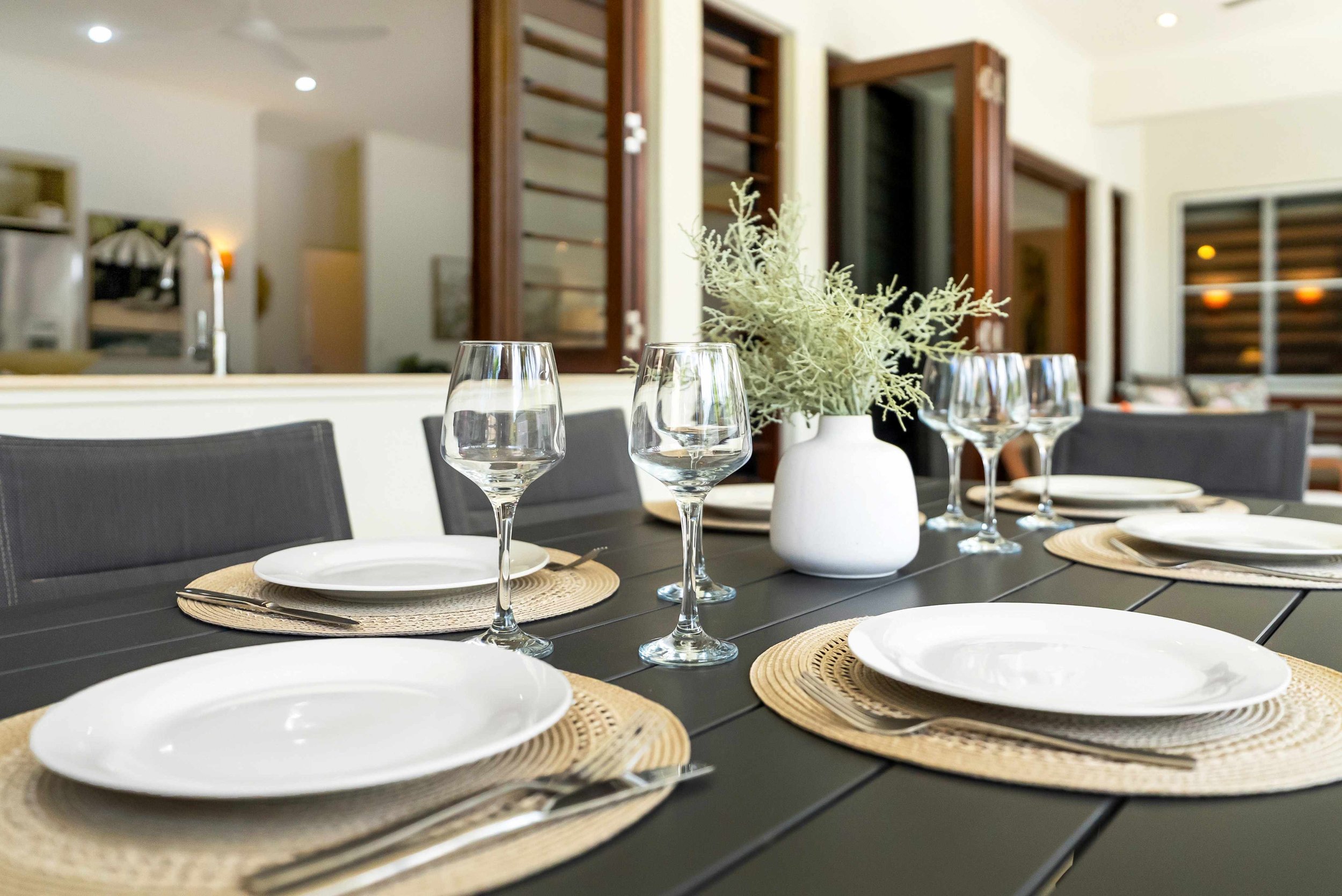 Pass-through between kitchen and alfreco dining. Styled using Sunhaven's amenities