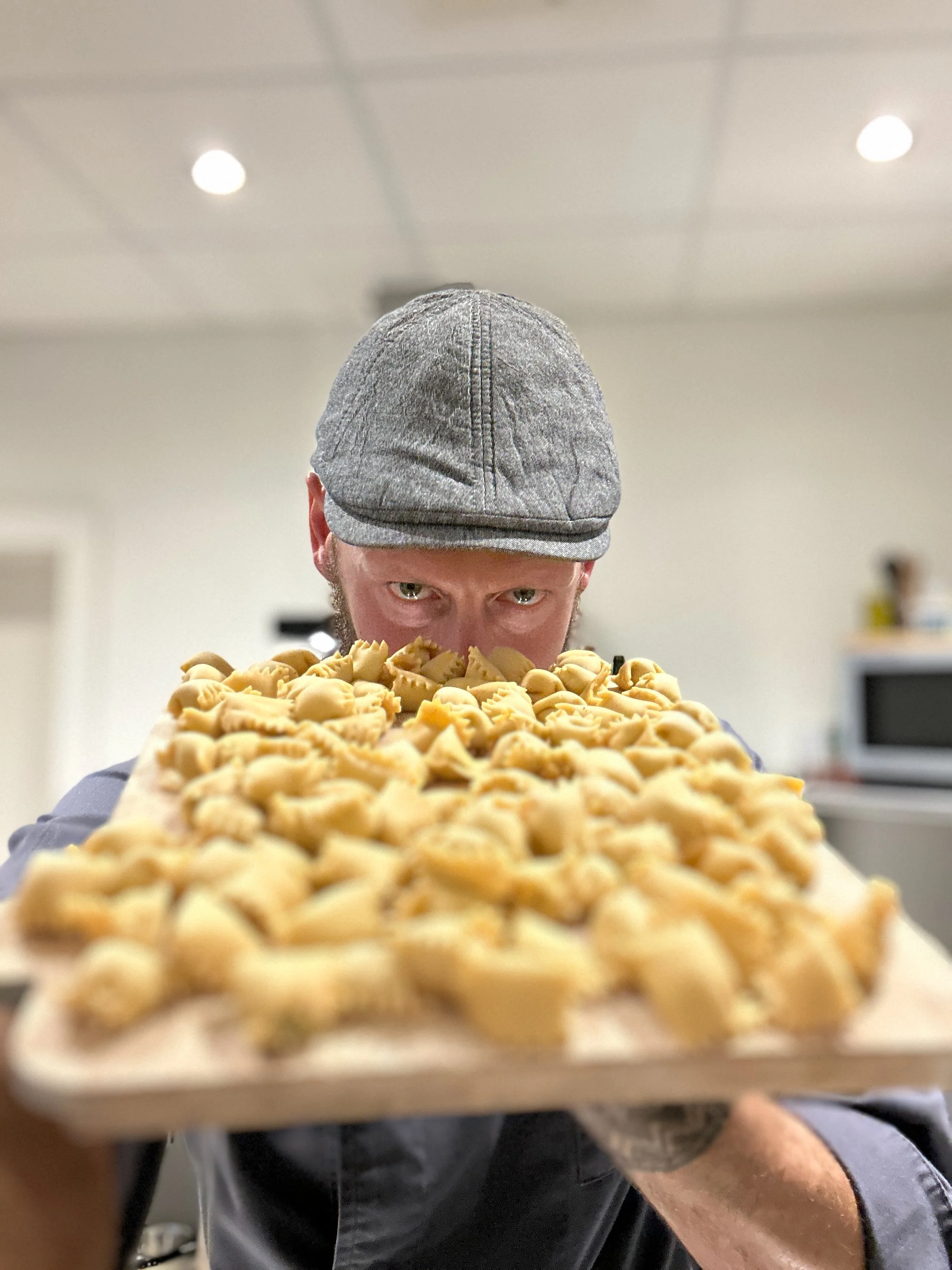chef checking agnolotti