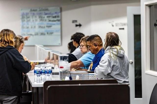 Pop's Bingo Hall - Staff Helping Customers