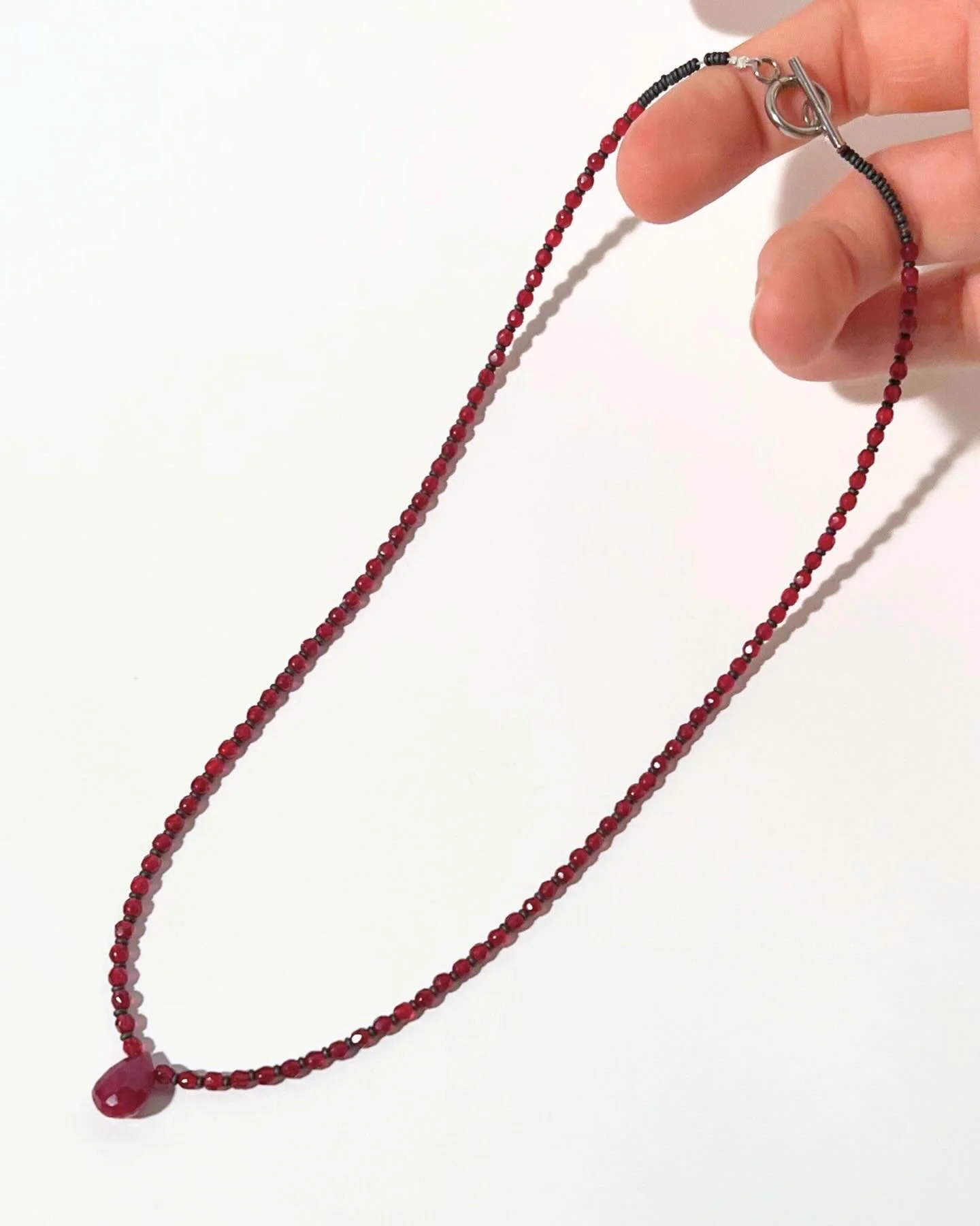 Necklace with Ruby drop and fire polished Czech glass