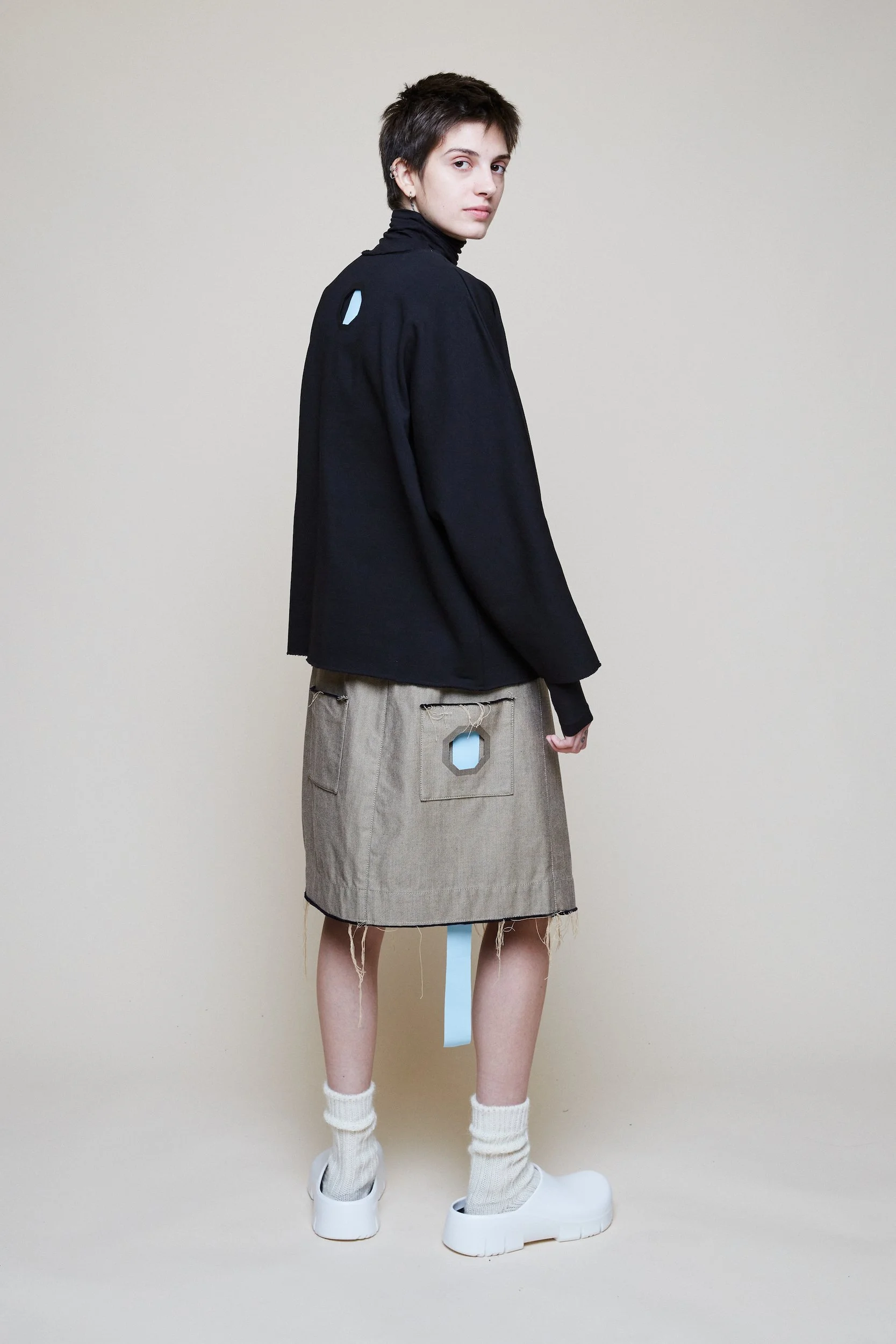 Elena - black jkt turning.jpg