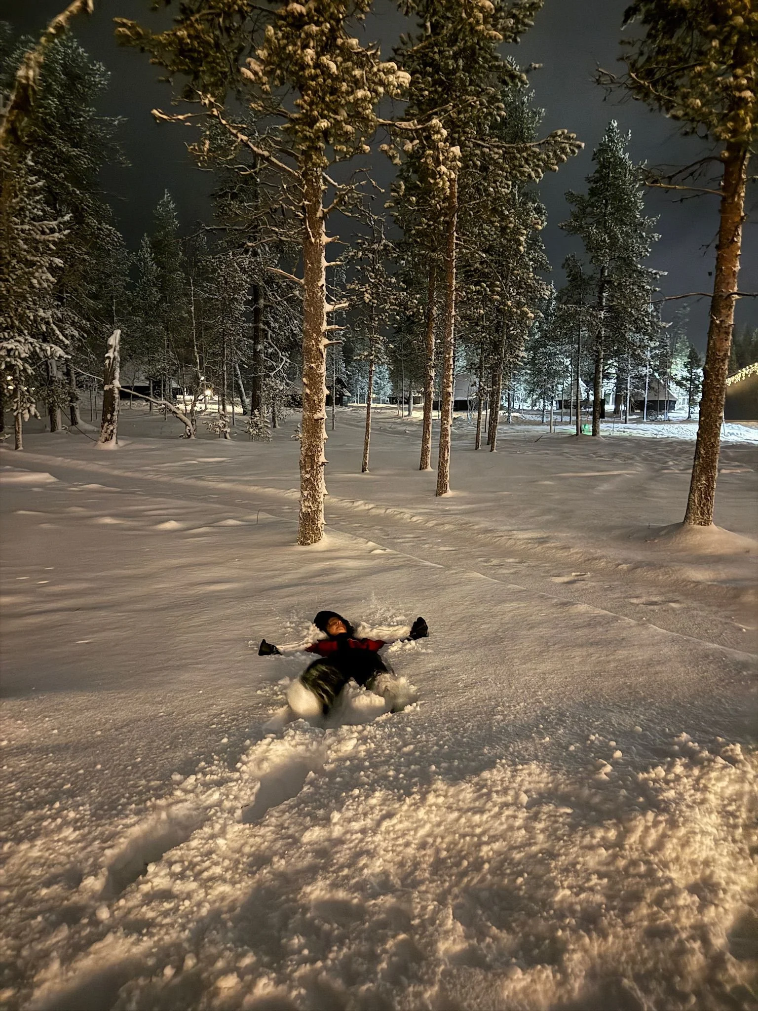 Making snowangels, Northern Lights VIllage, Saariselka
