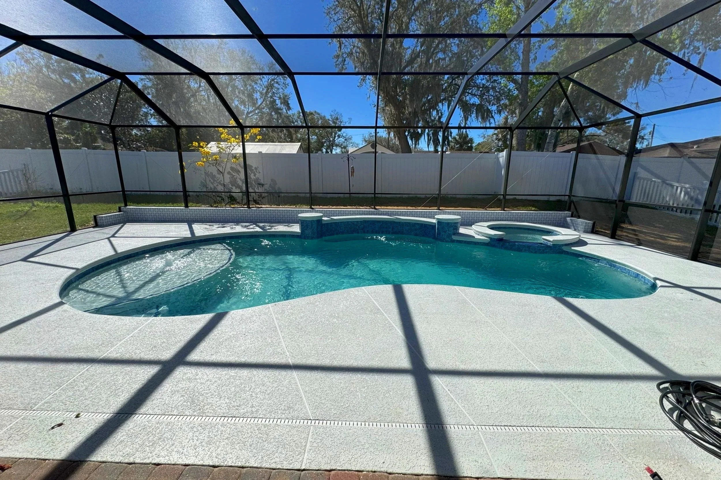 Pool with Bubbler, Sunshelf, and Spa