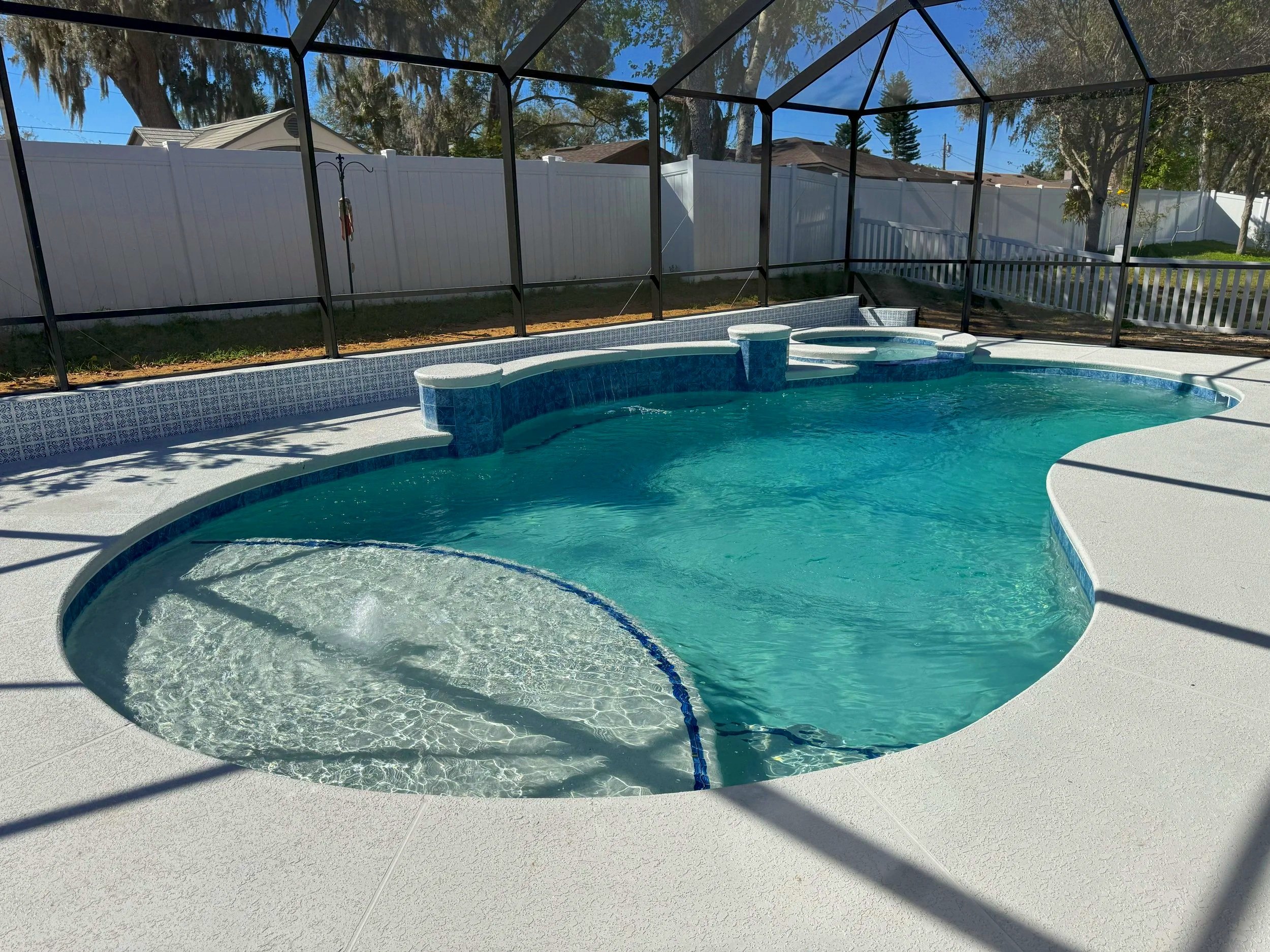 Pool with Bubbler, Sunshelf, and Spa