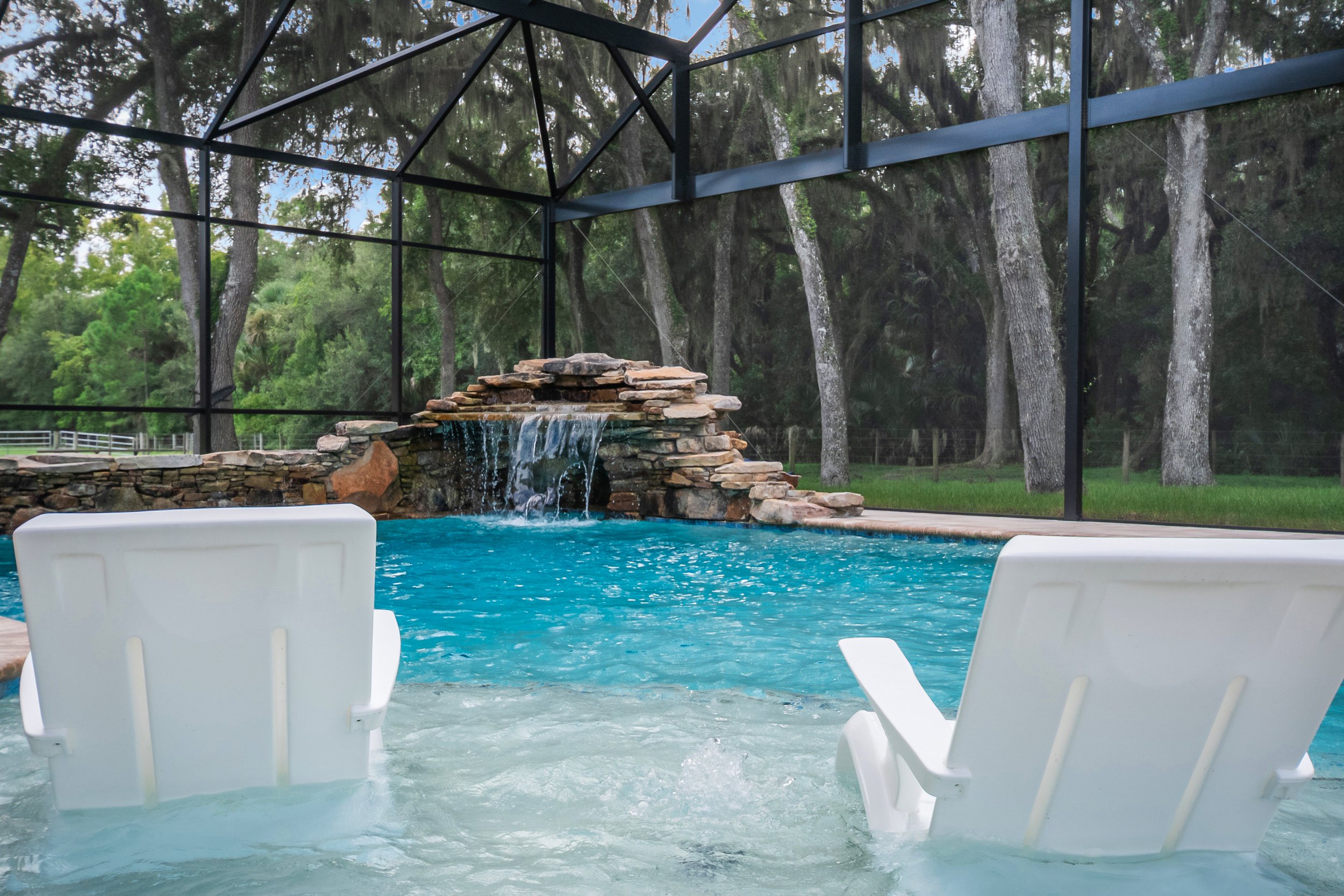 Oversized Sun Shelf and Natural Stacked Stone Waterfall Grotto