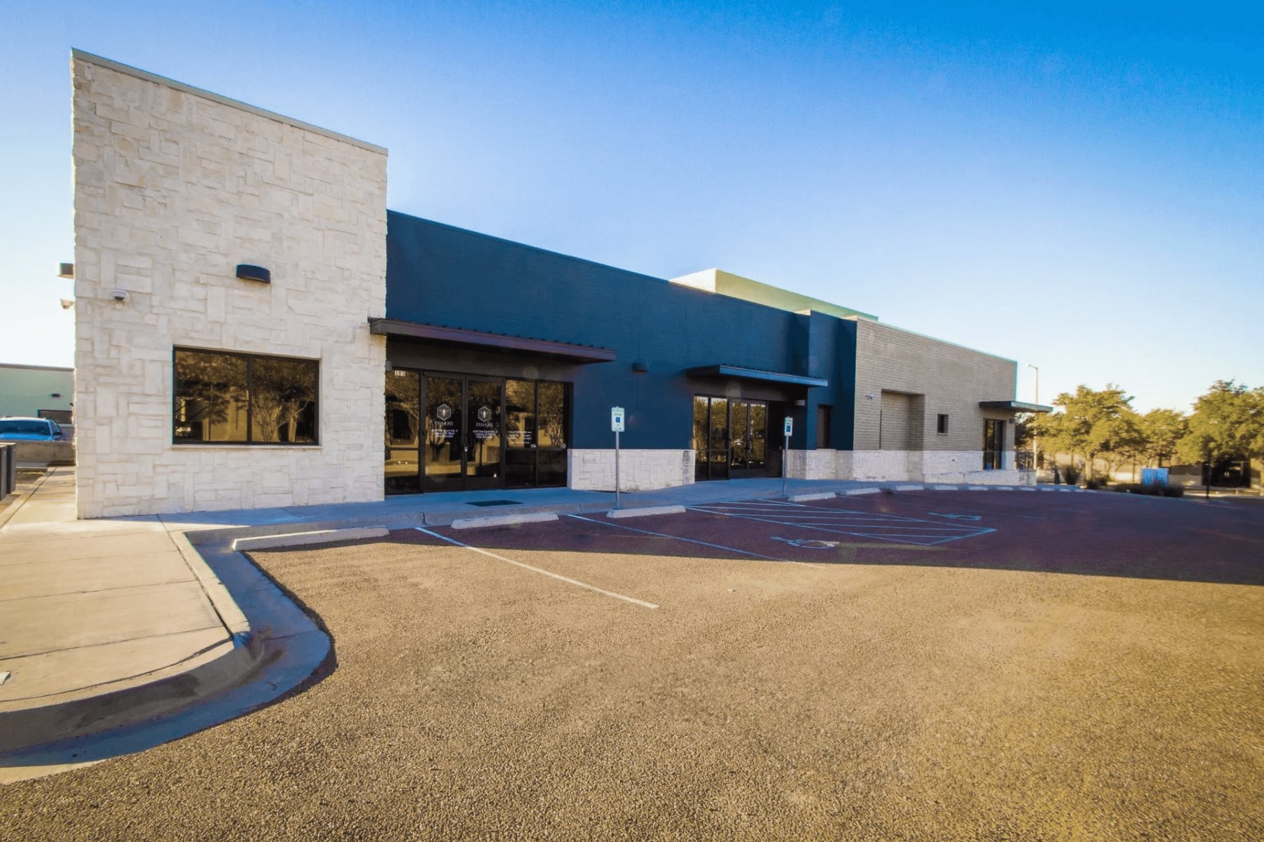 Street-facing exterior of a dental office in Laredo, Texas, a commercial healthcare construction built to provide advanced dental treatments in a welcoming environment.