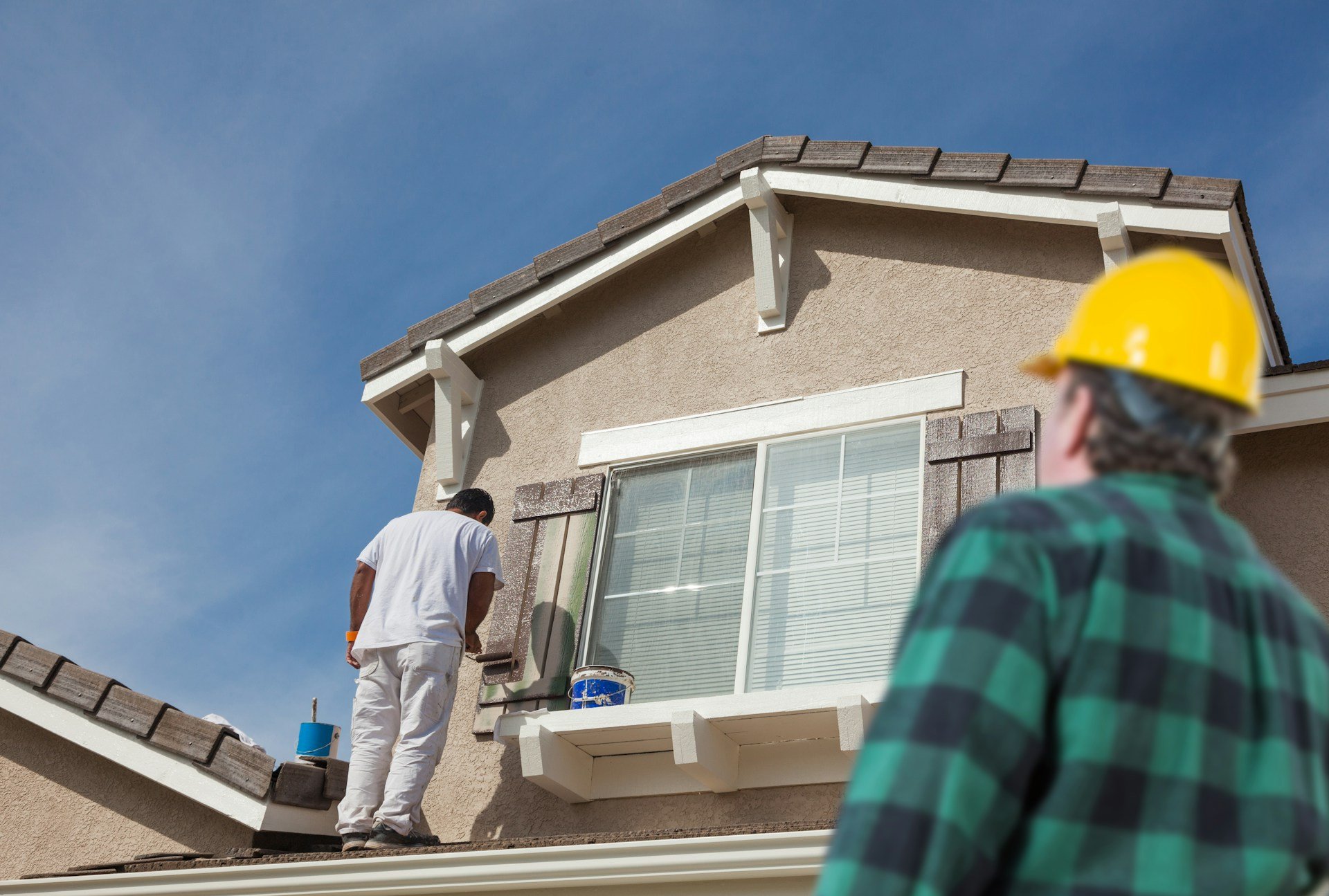 Winnipeg Summer Exterior Upgrades: Decks, Roofing, Siding, Permits