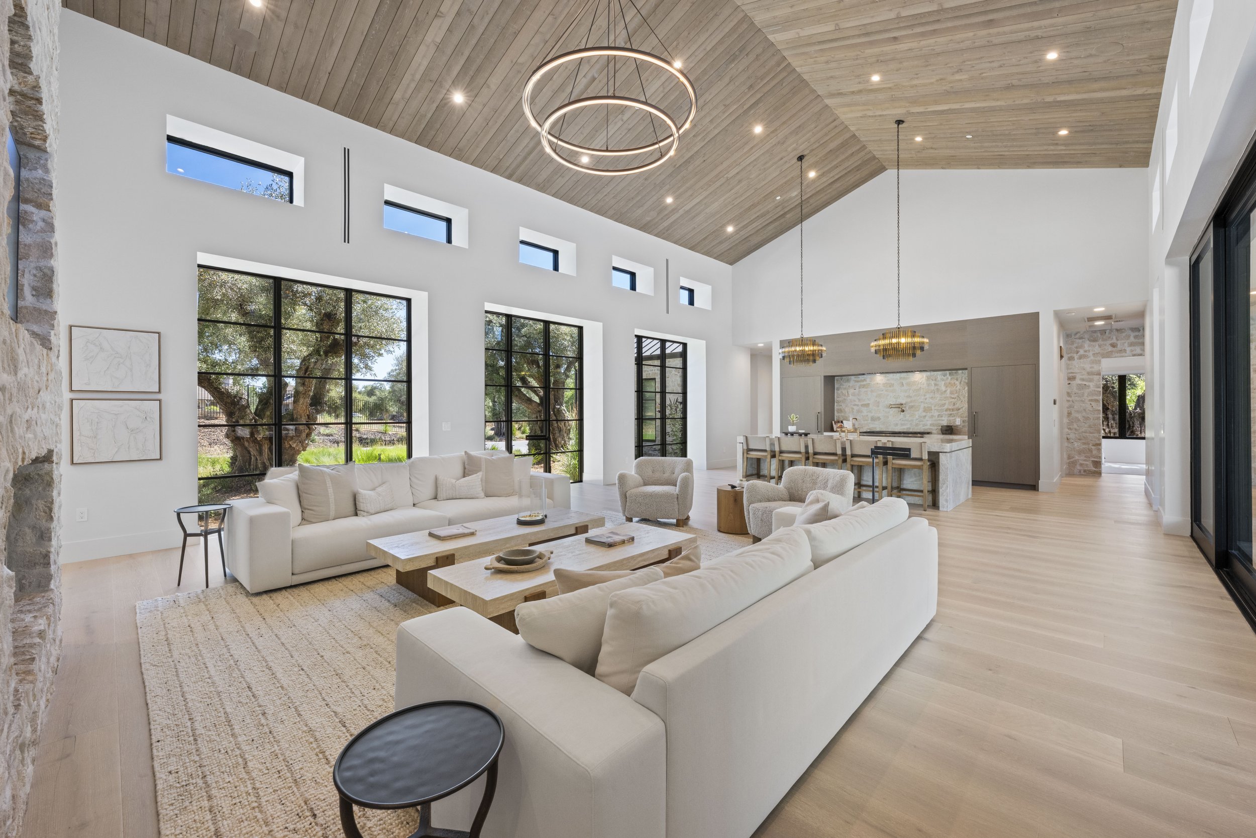 Luxury great room and kitchen real estate photography by Snap A Prop, 6049 Via De La Rosa