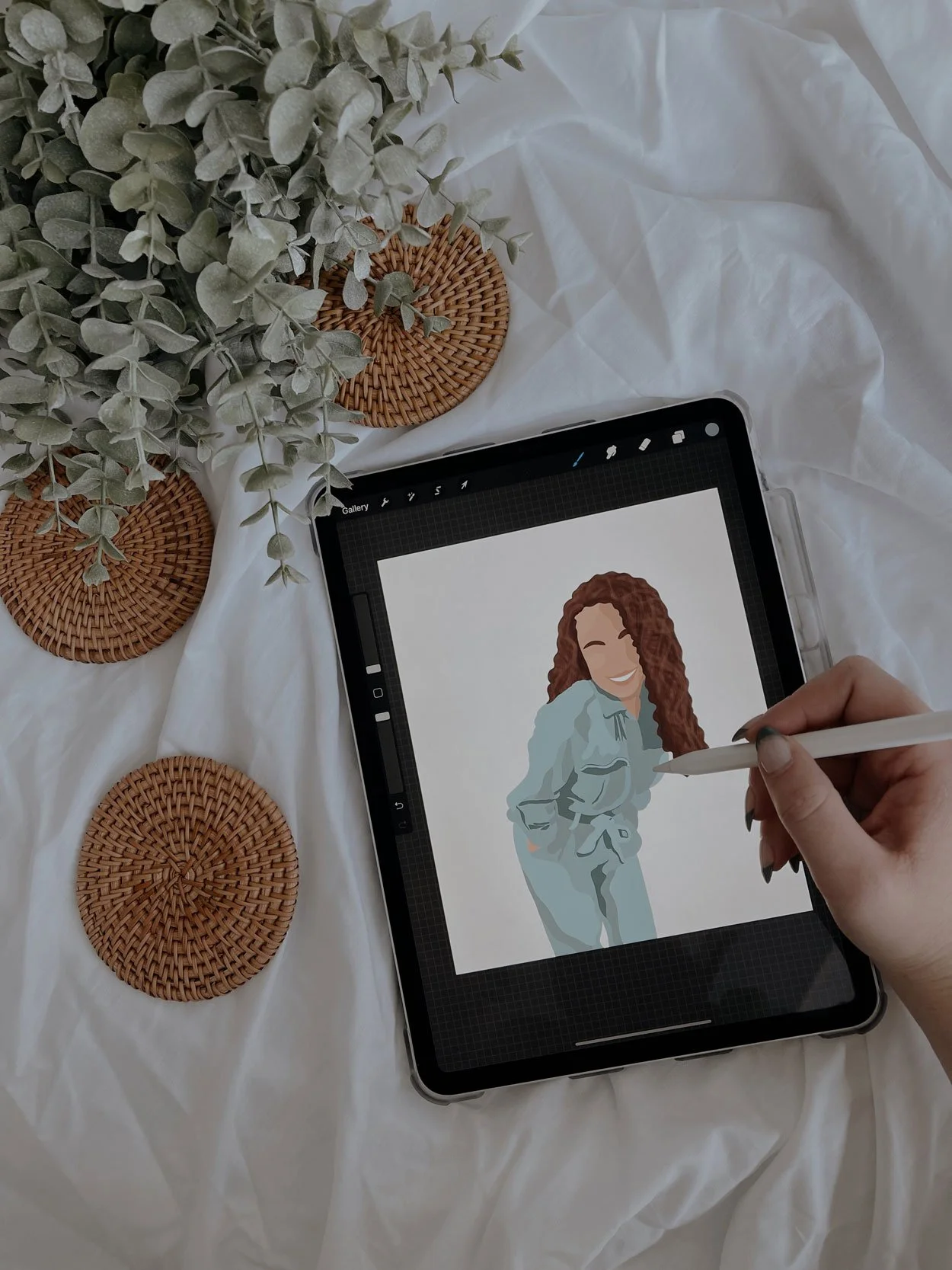 An iPad displaying a digital portrait of a woman.