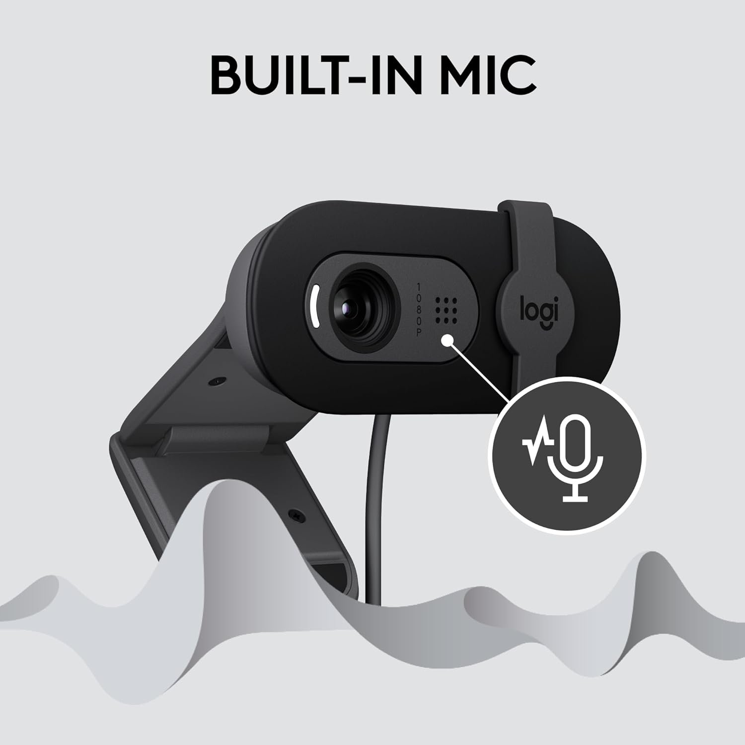 A Logitech webcam with a built-in microphone, mounted on a stand, featuring a lens and an icon indicating audio recording.