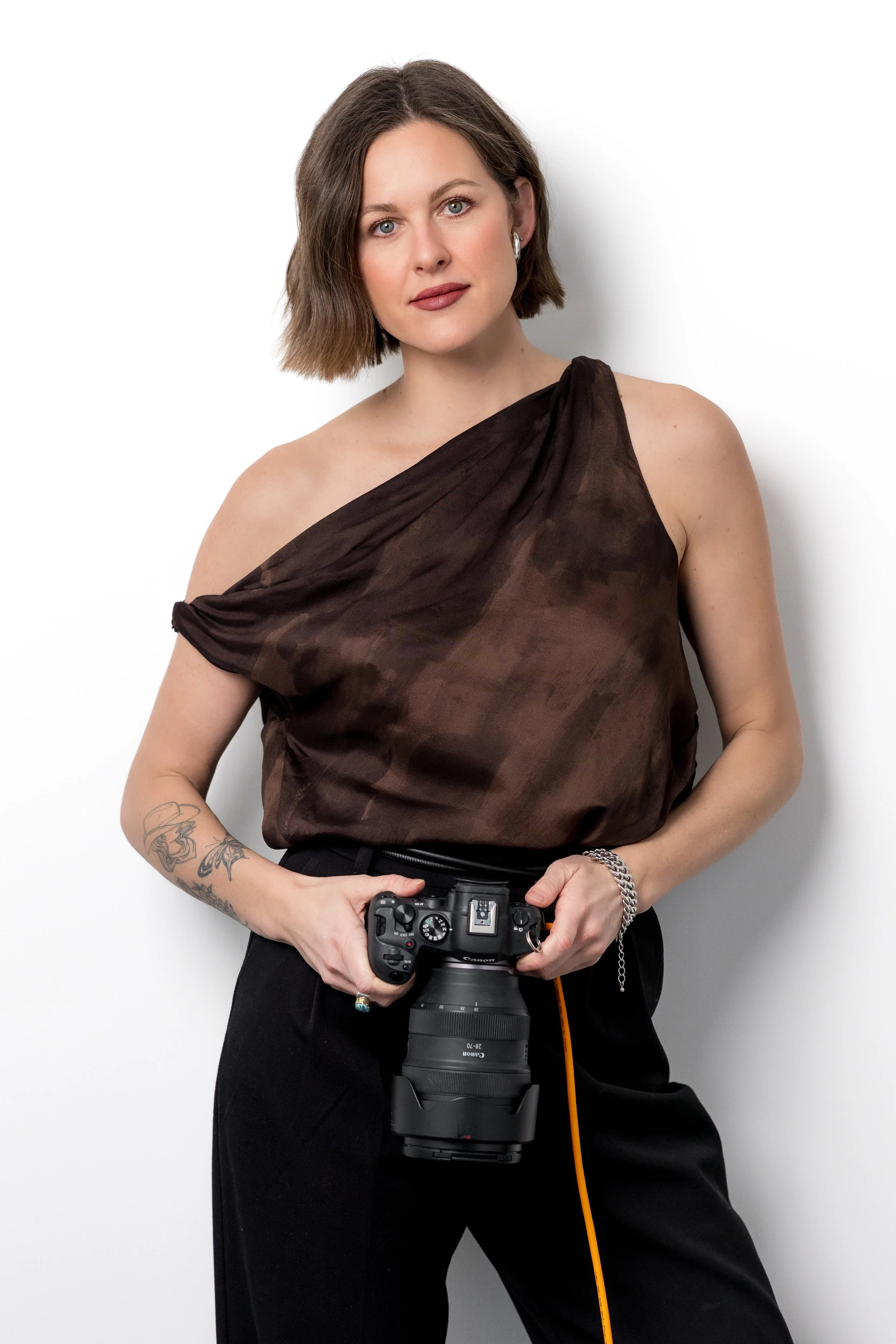 Jules Brown at House of 301, portrait of women founder with camera