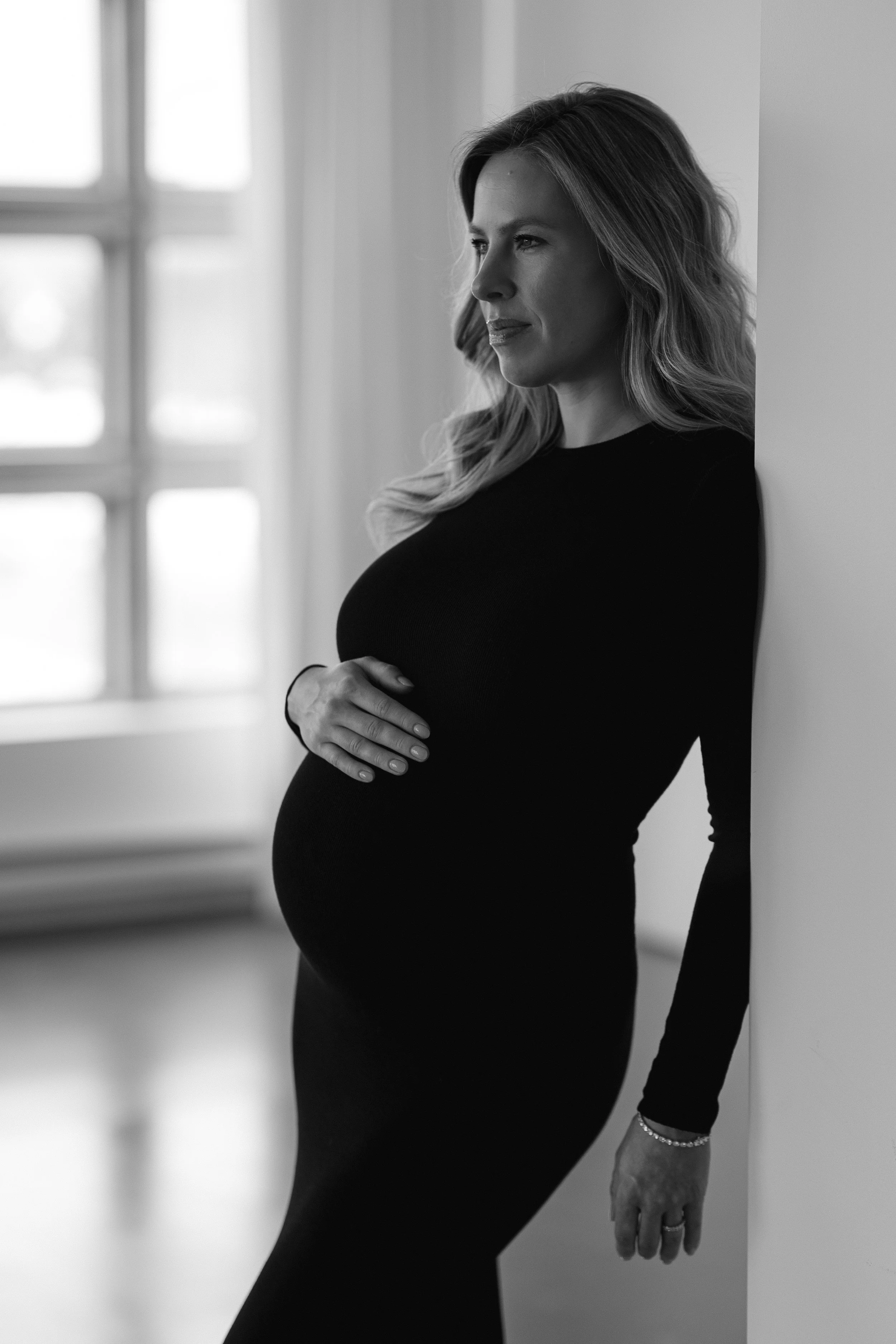 Pregnancy maternity photoshoot in studio at house of 301 located in traverse city michigan