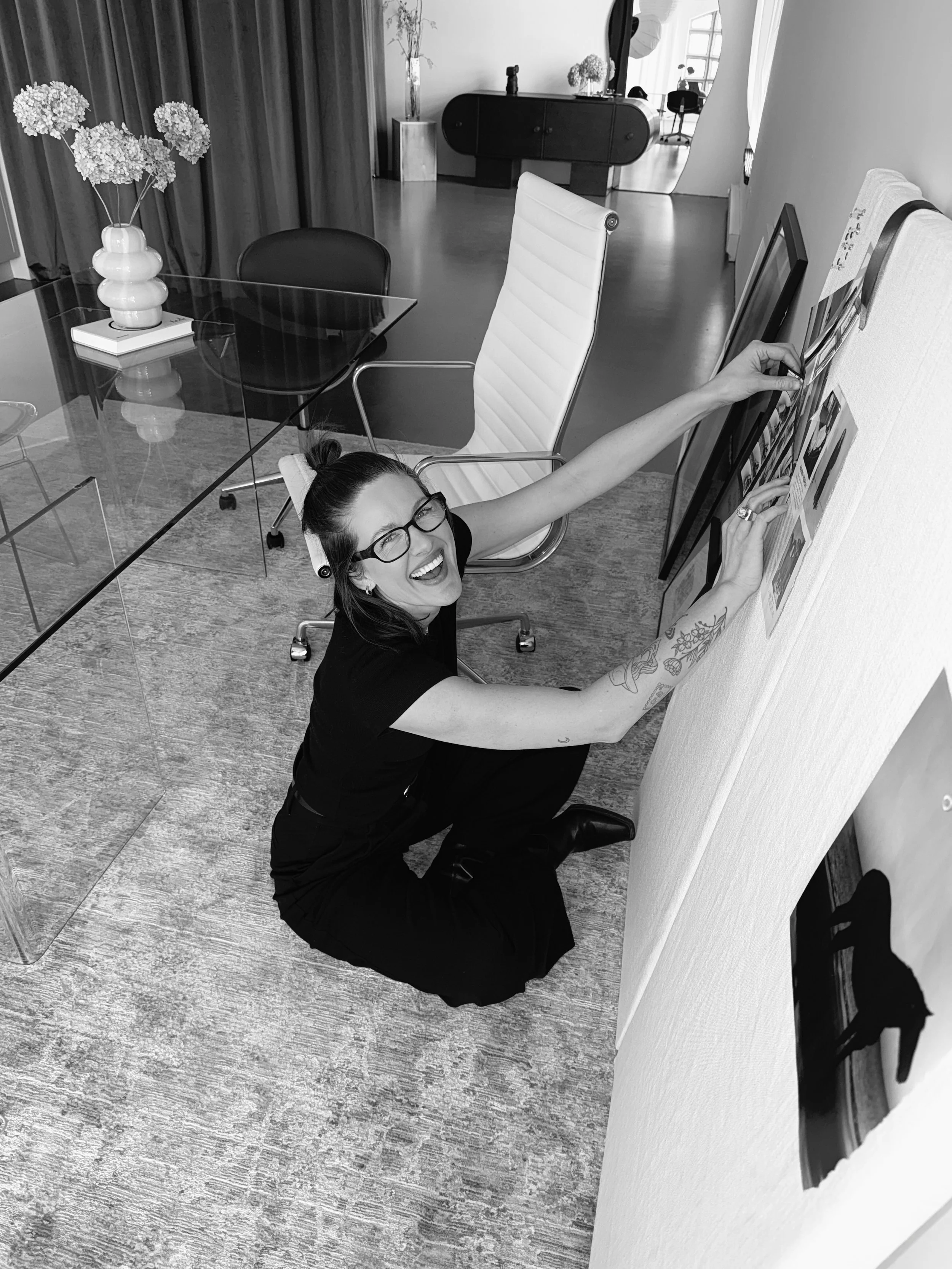 Woman putting together a mood board for a photoshoot