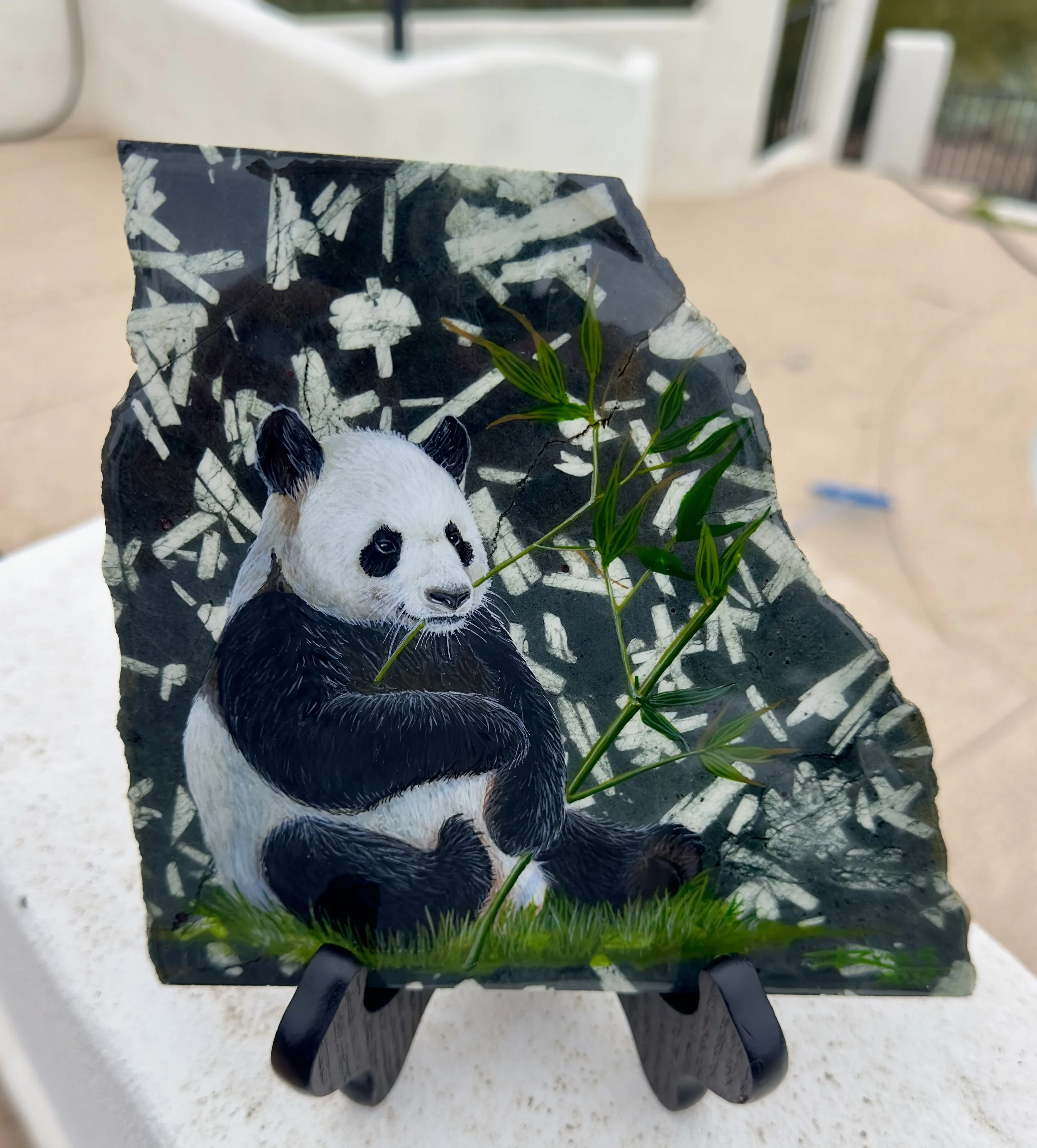 Panda on Chinese writing stone