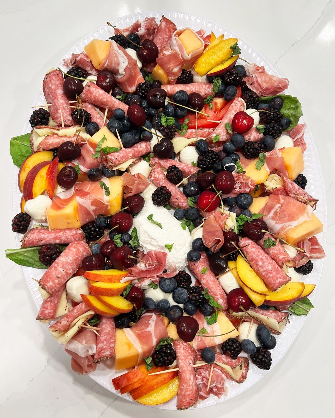 The &quot;Classic Italian Board&quot; ft. imported prosciutto, fresh burrata, juicy seasonal peaches, and more! 🤤