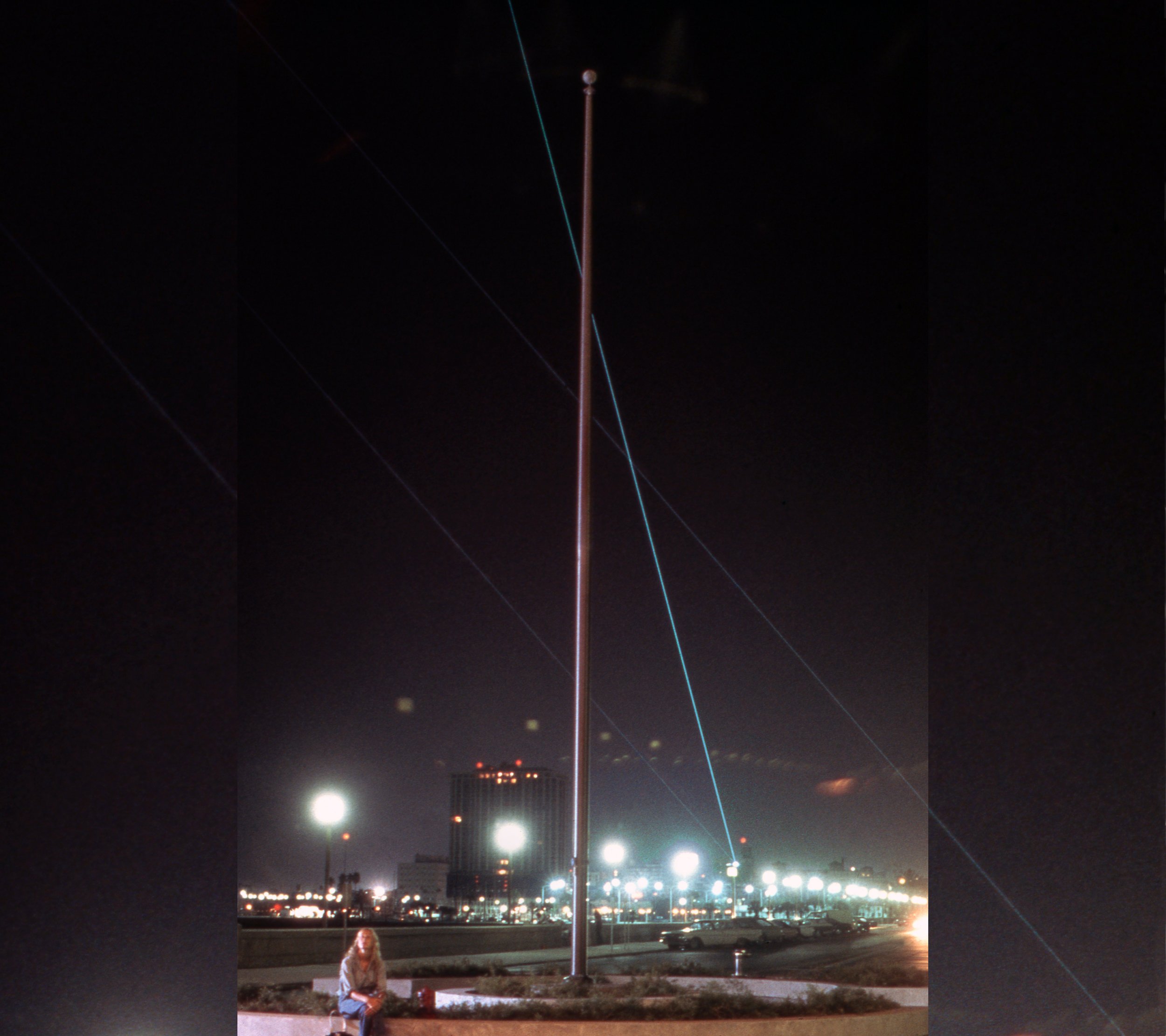 ‘What emanates from it will be, in Krebs’ words, “a configuration of light that goes out over the city…about six different structures of light that result from this mechanism moving.”’ Jim Moorhead, St. Petersburg Independent, 1976, The Laser Beams I