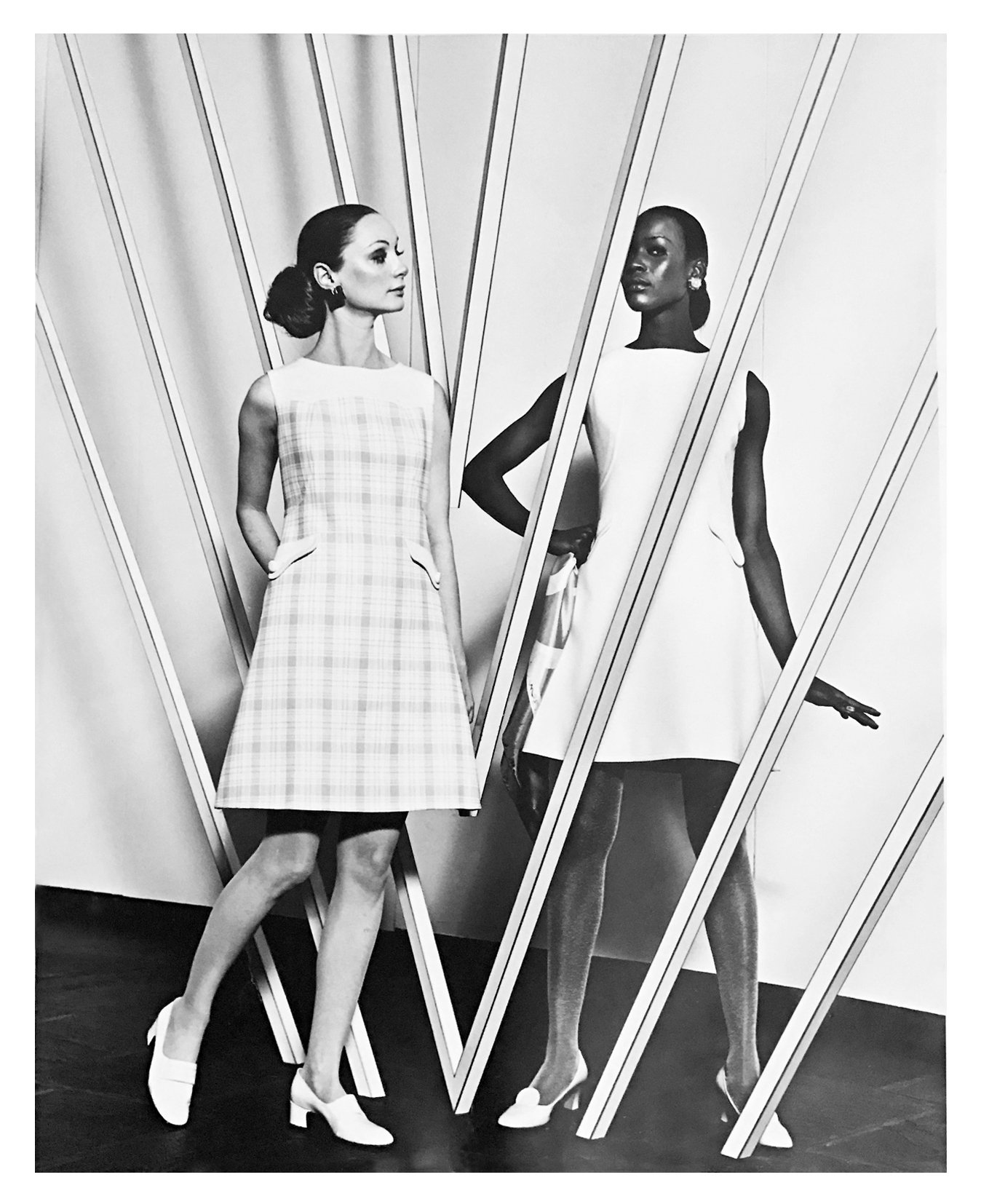 Untitled, 1968. Aluminum and light reflective tape, 154 x 154 x 120". Models in a fashion photo shoot, 1968.