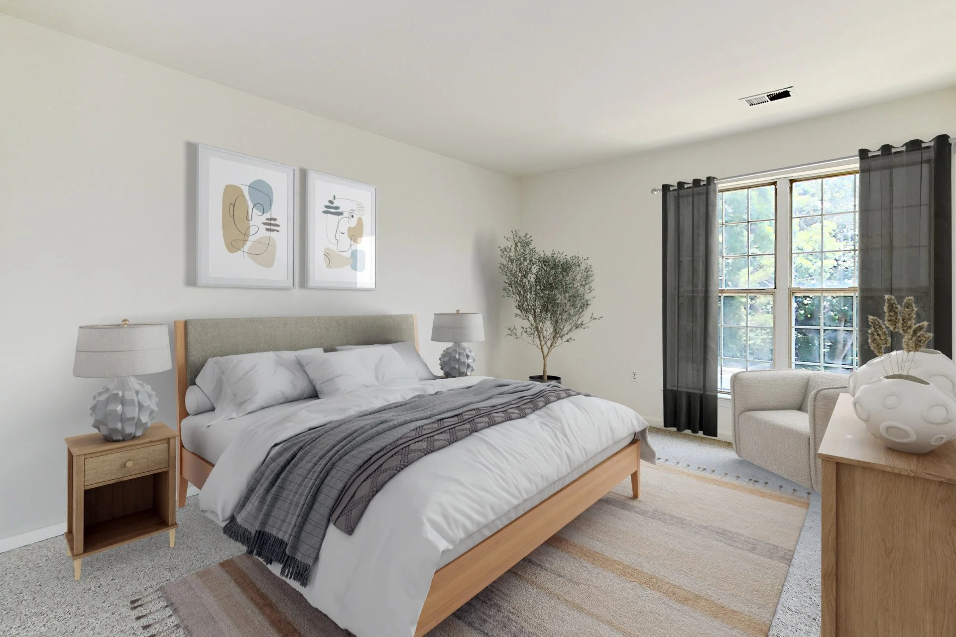 A bedroom with a bed, nightstands, table lamps, a framed abstract art above the bed, a window with black curtains, a beige armchair, a wooden dresser with a white decorative vase, a potted tree, and a light-colored area rug.