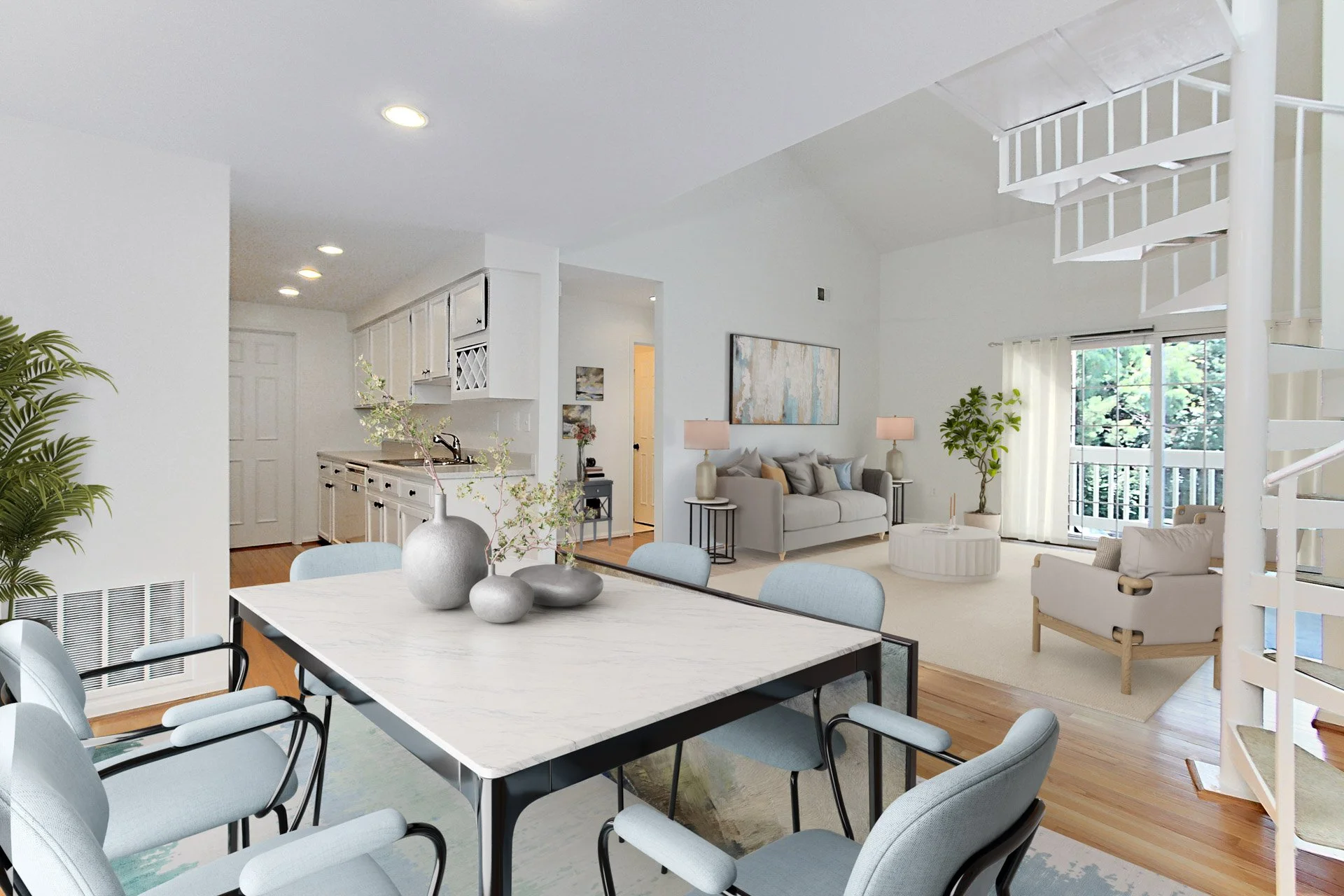 Open-concept living room and dining area with white walls, hardwood floors, and modern furniture. Dining table with light blue chairs, decorative vases, and a cozy seating area with a sofa, armchair, and large window with curtains.