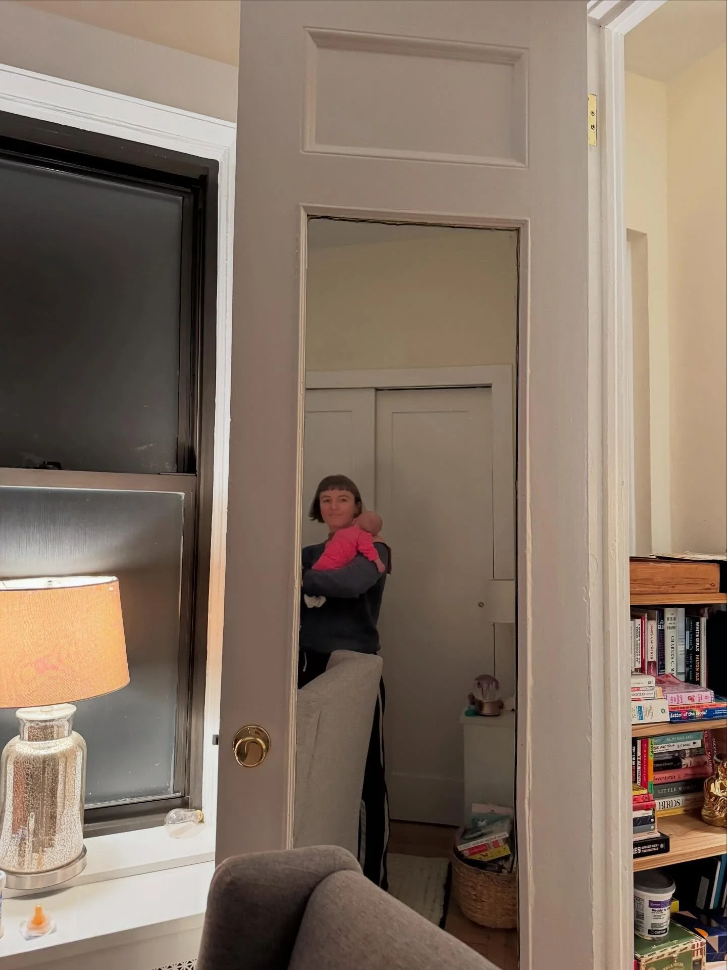 Catching a glimpse of myself with a babe on my shoulder always makes me smile. Feeling the rise and fall of their chest breathing against mine ❤️.