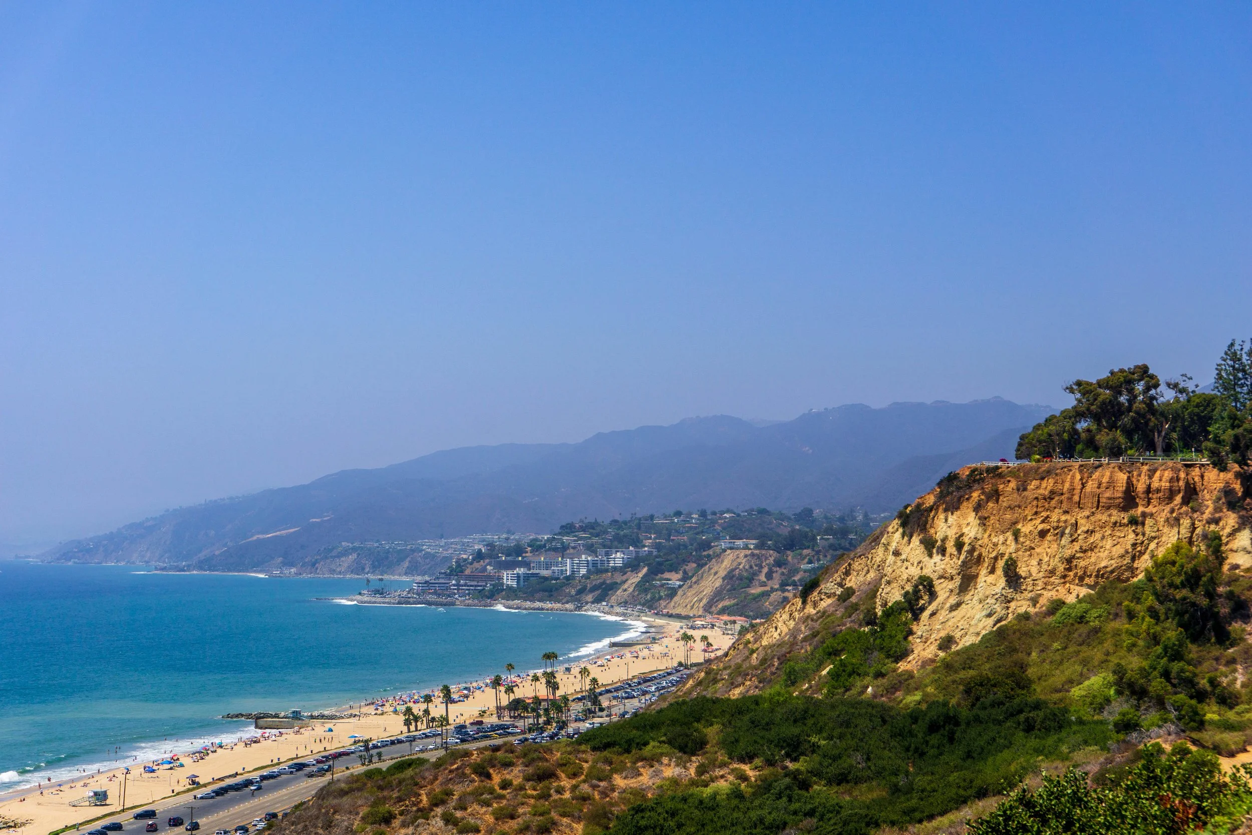 aerial image of the Pacific Palisades, including ocean and coastal cliffs