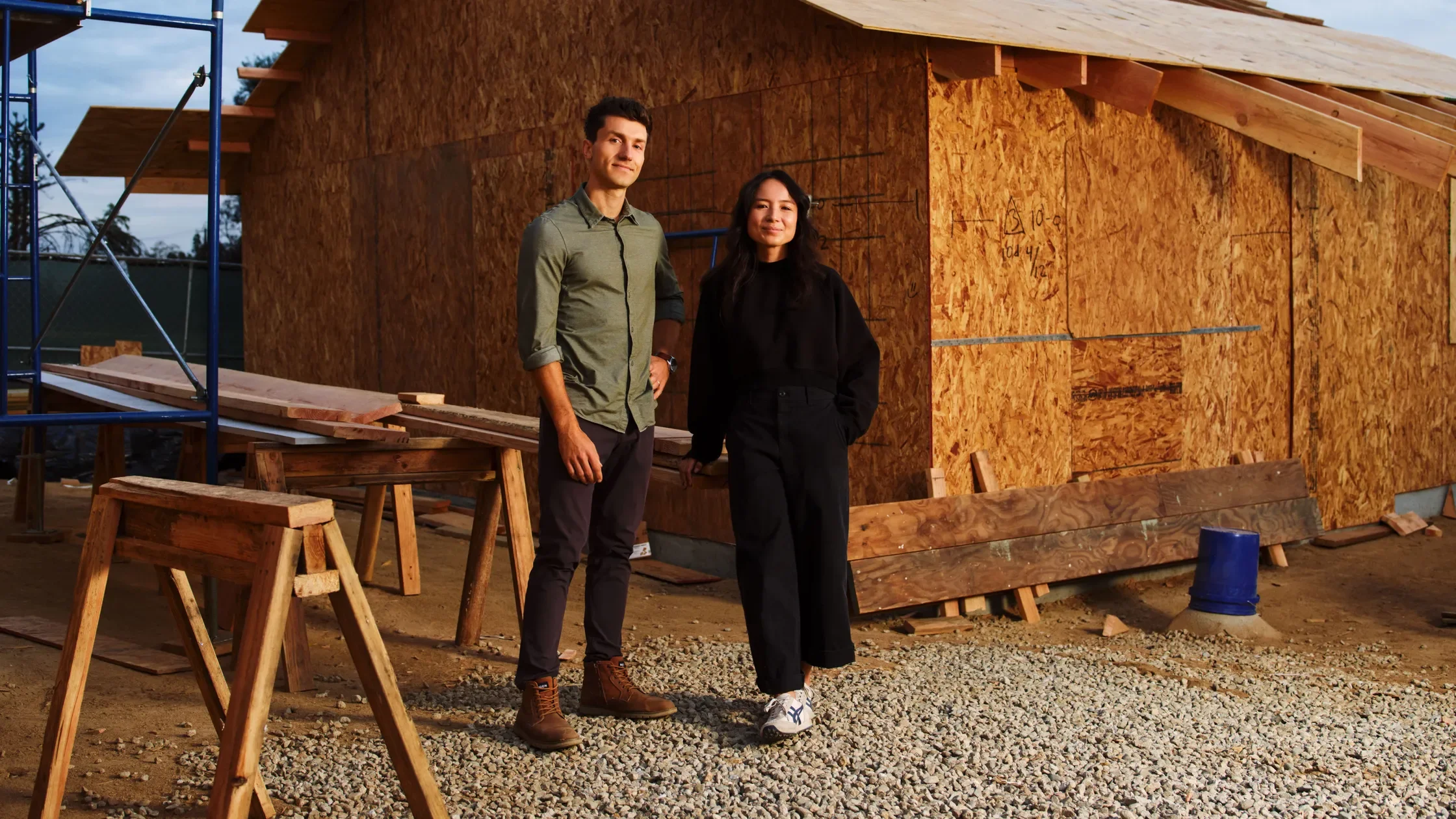 Image from Architectural Digest of TFCF cofounders at a rebuild site