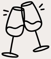 Two glasses with drinks clinking together in a toast