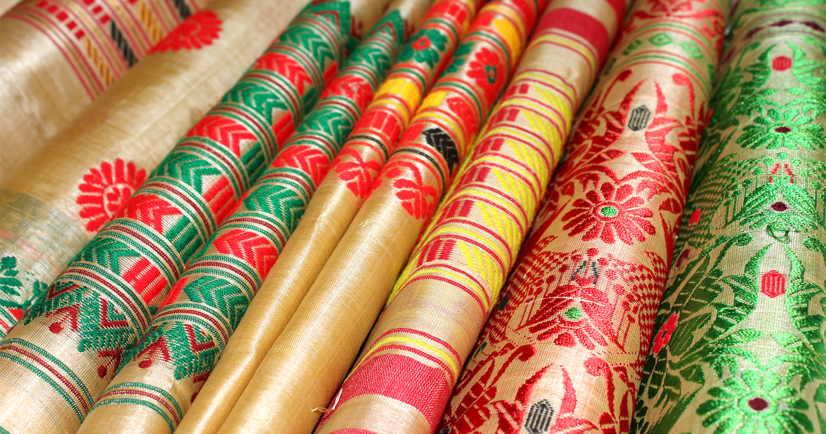 folded Muga silk pieces with woven borders, Assam