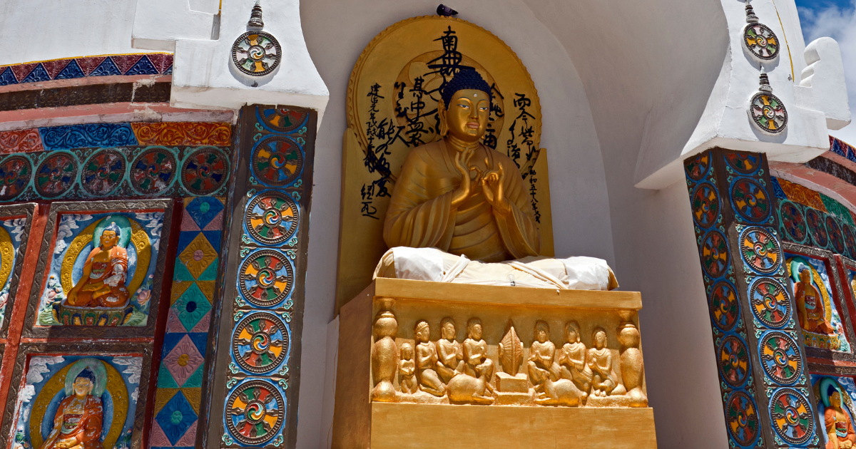 Golden Buddha statue at the Shanti Stupa in Leh
