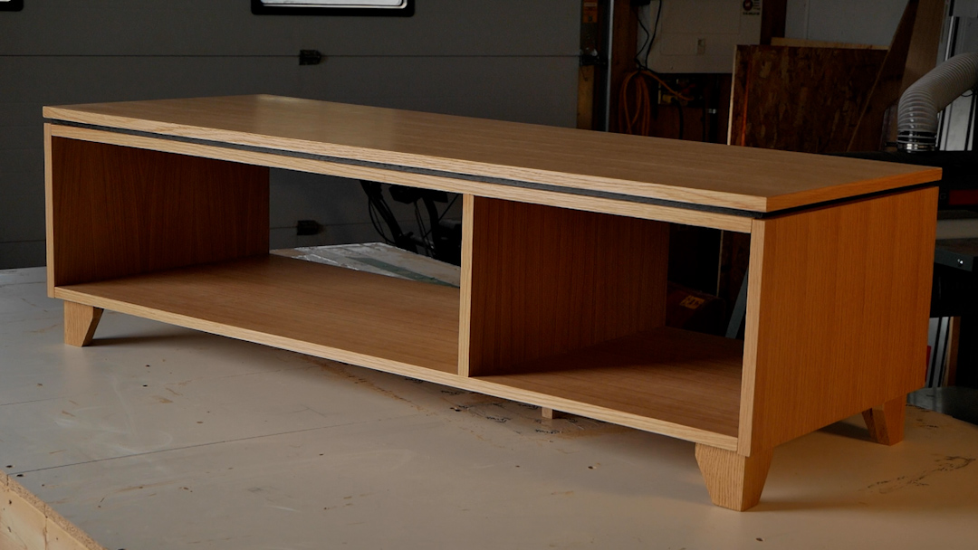 A wooden mid-century modern style coffee table.