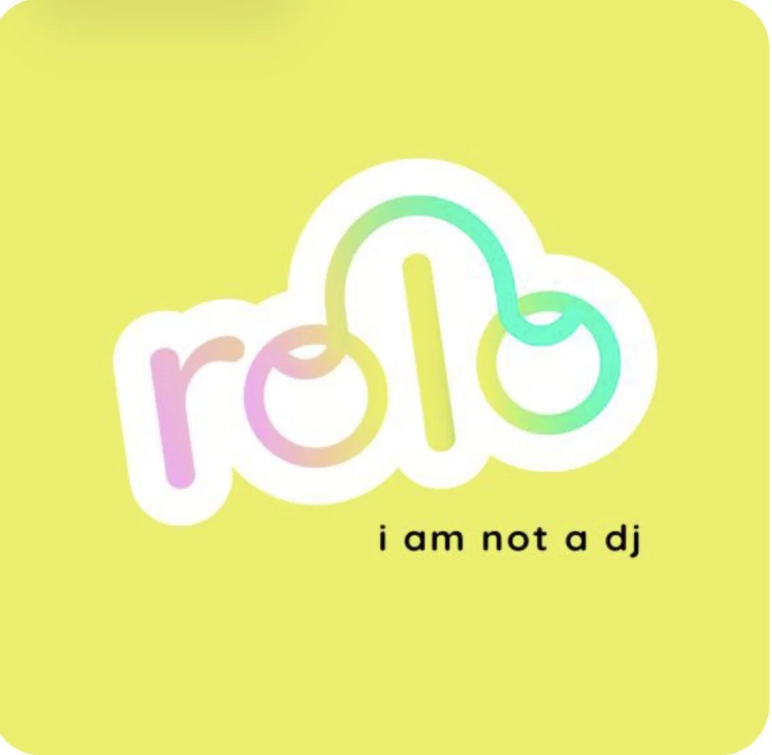 Colorful logo with the word "rolo" in pastel rainbow colors and the phrase "i am not a dj" below on a yellow background.