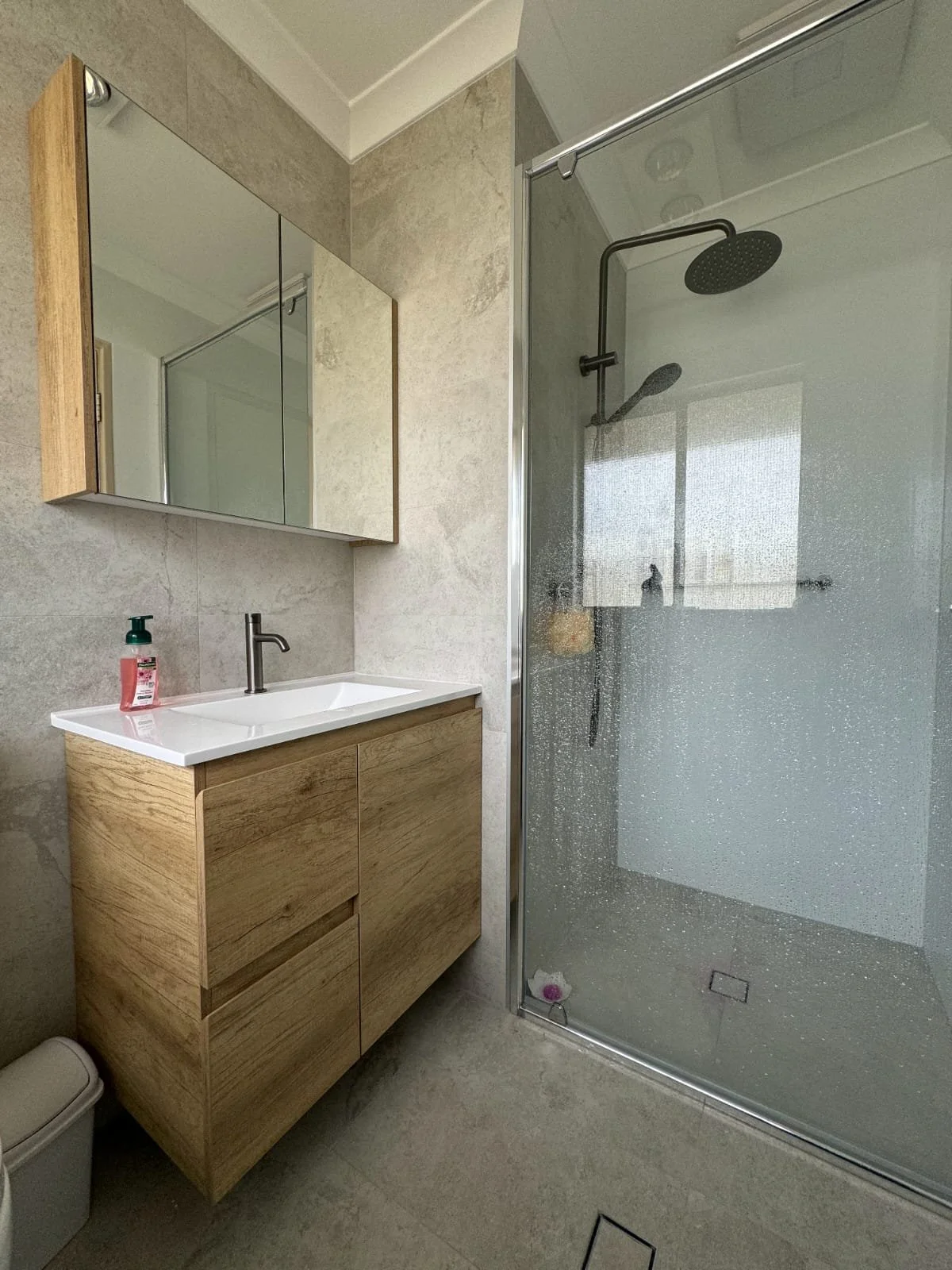 Bathroom renovation in Perth with frameless shower and tiling by Ridge Renovations