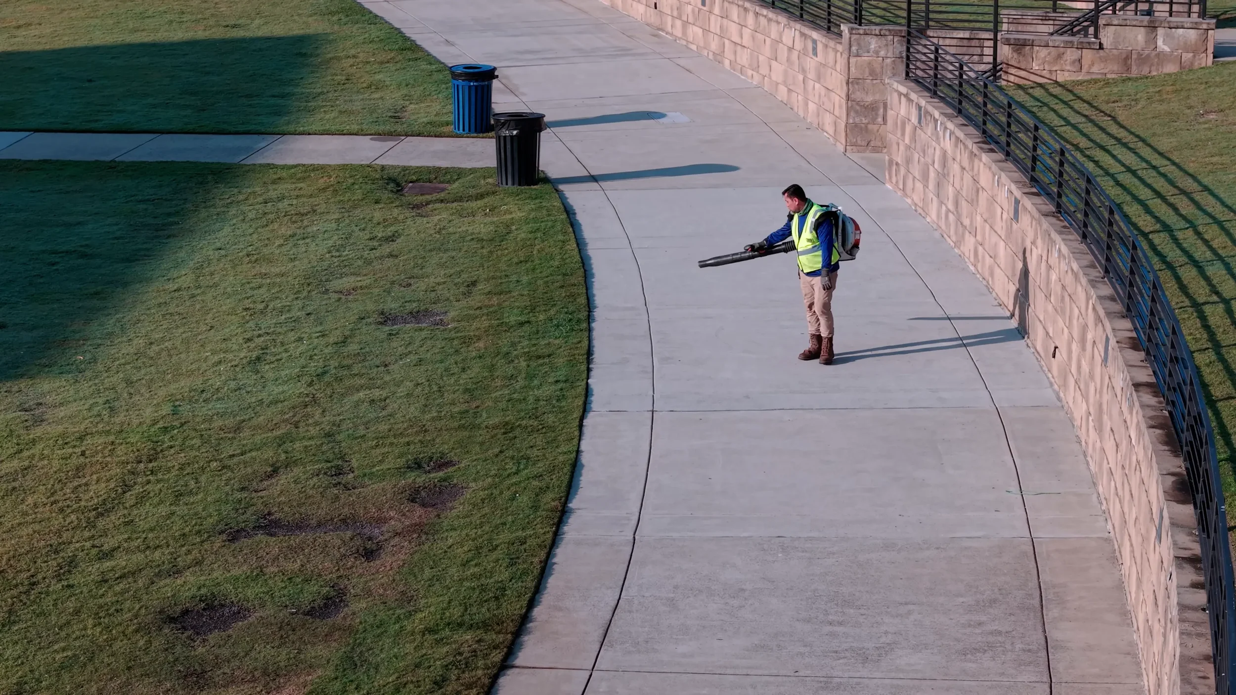 Public sidewalk and landscaped green space maintained for high foot traffic in Woodstock, GA
