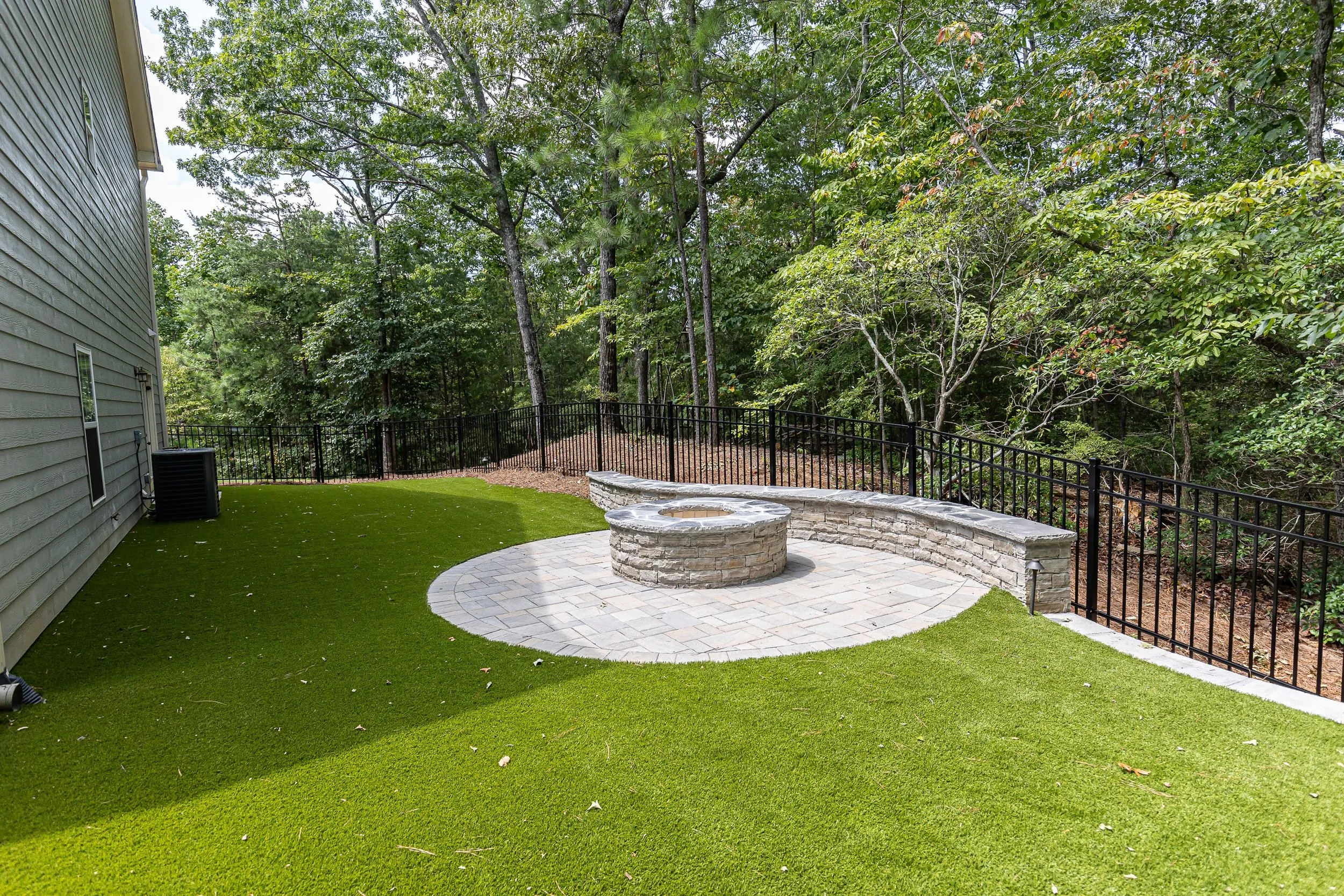 Gas or Wood: What a Fire Pit Contractor in Woodstock, GA Asks First