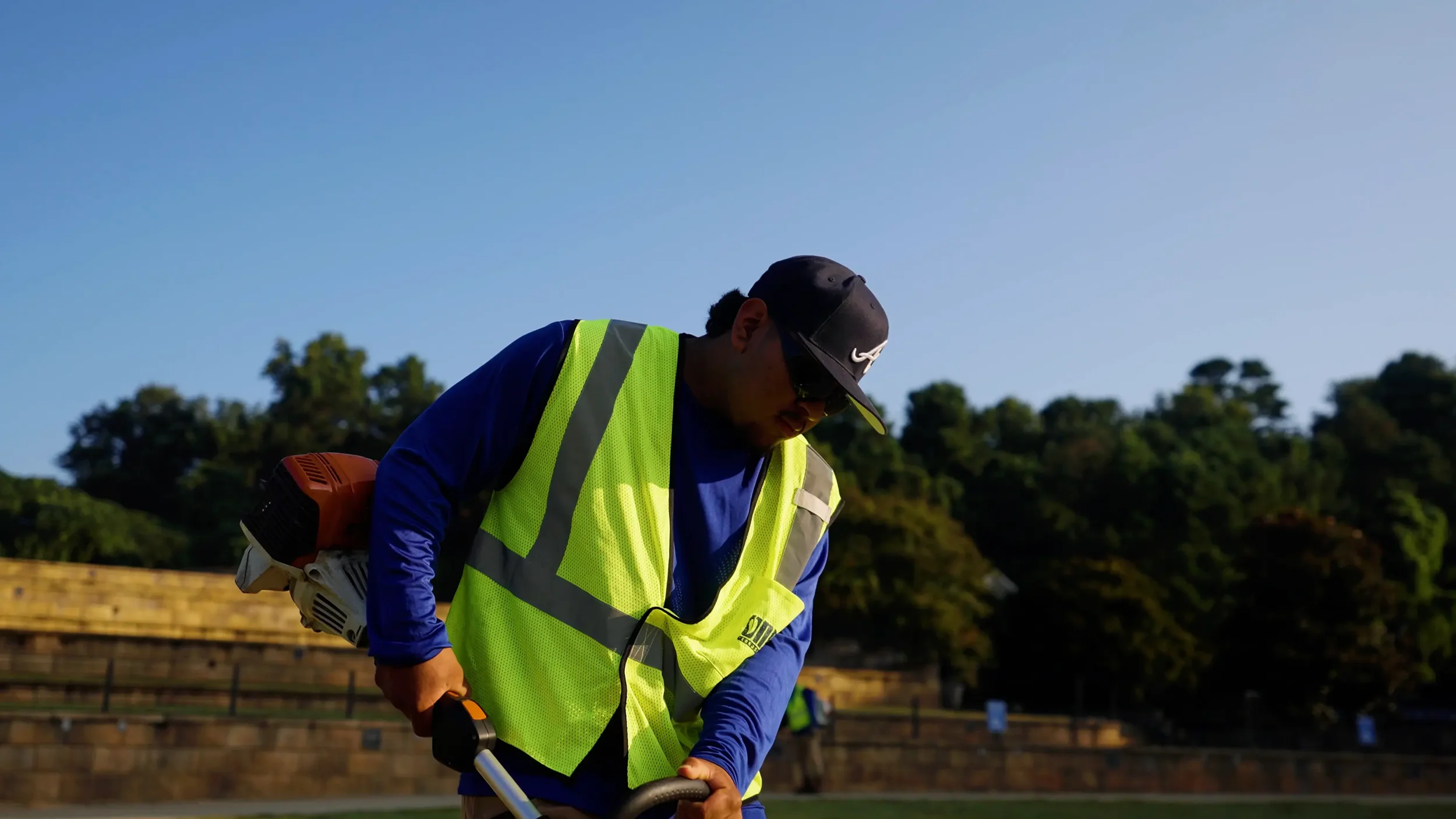 Landscape maintenance crew working in a public space in Woodstock, GA