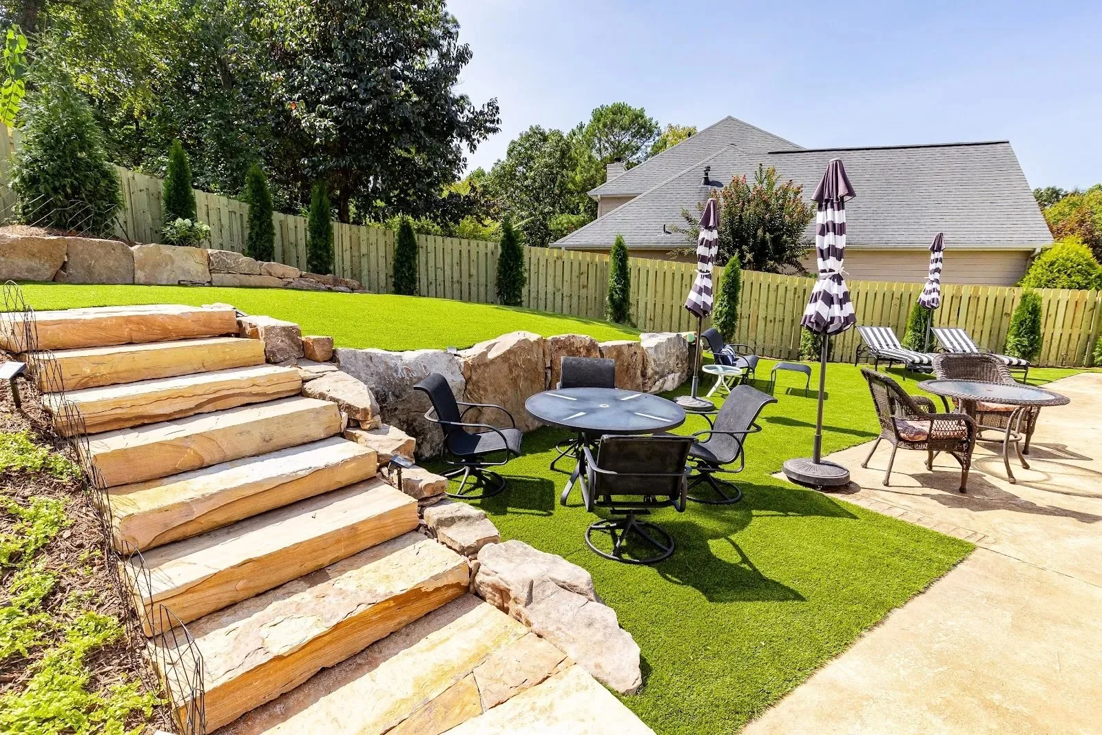 artificial turf lawn installation for low-maintenance backyard