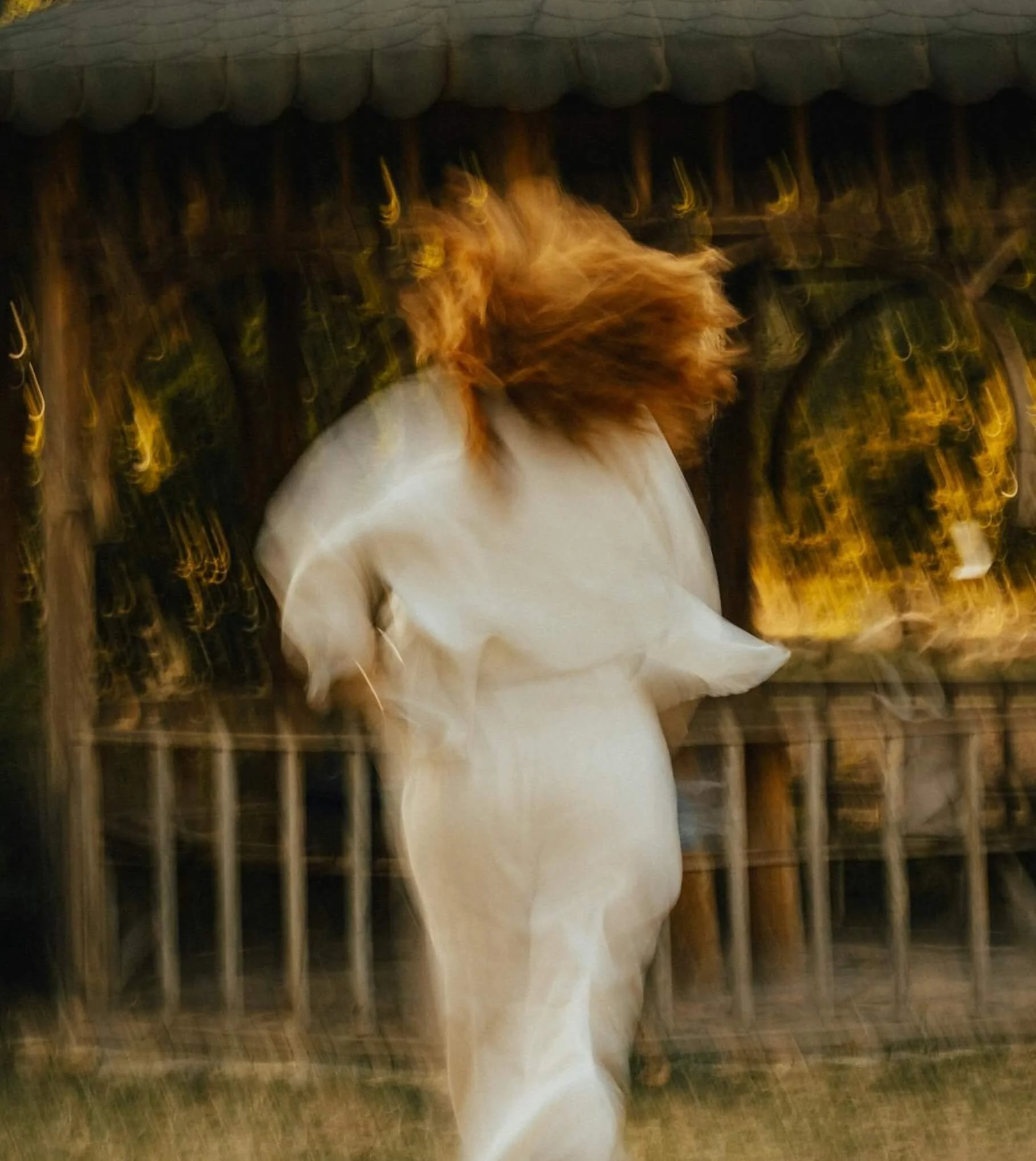 Blurred woman in motion outdoors, illustrating feelings explored in anxiety therapy.